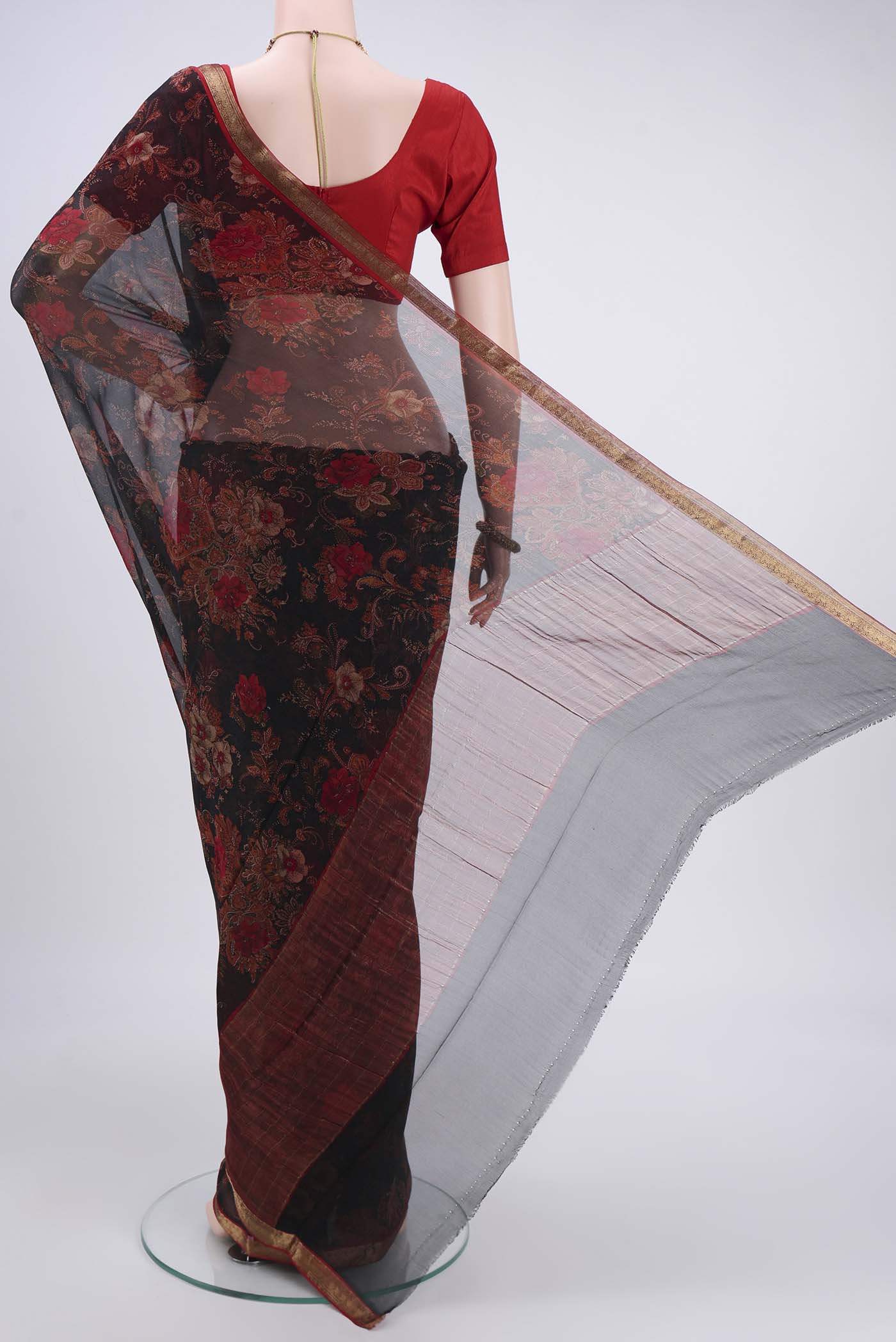 Flat view of Black Mysore Chiffon Saree with Floral Print on the body and Zari Border. 