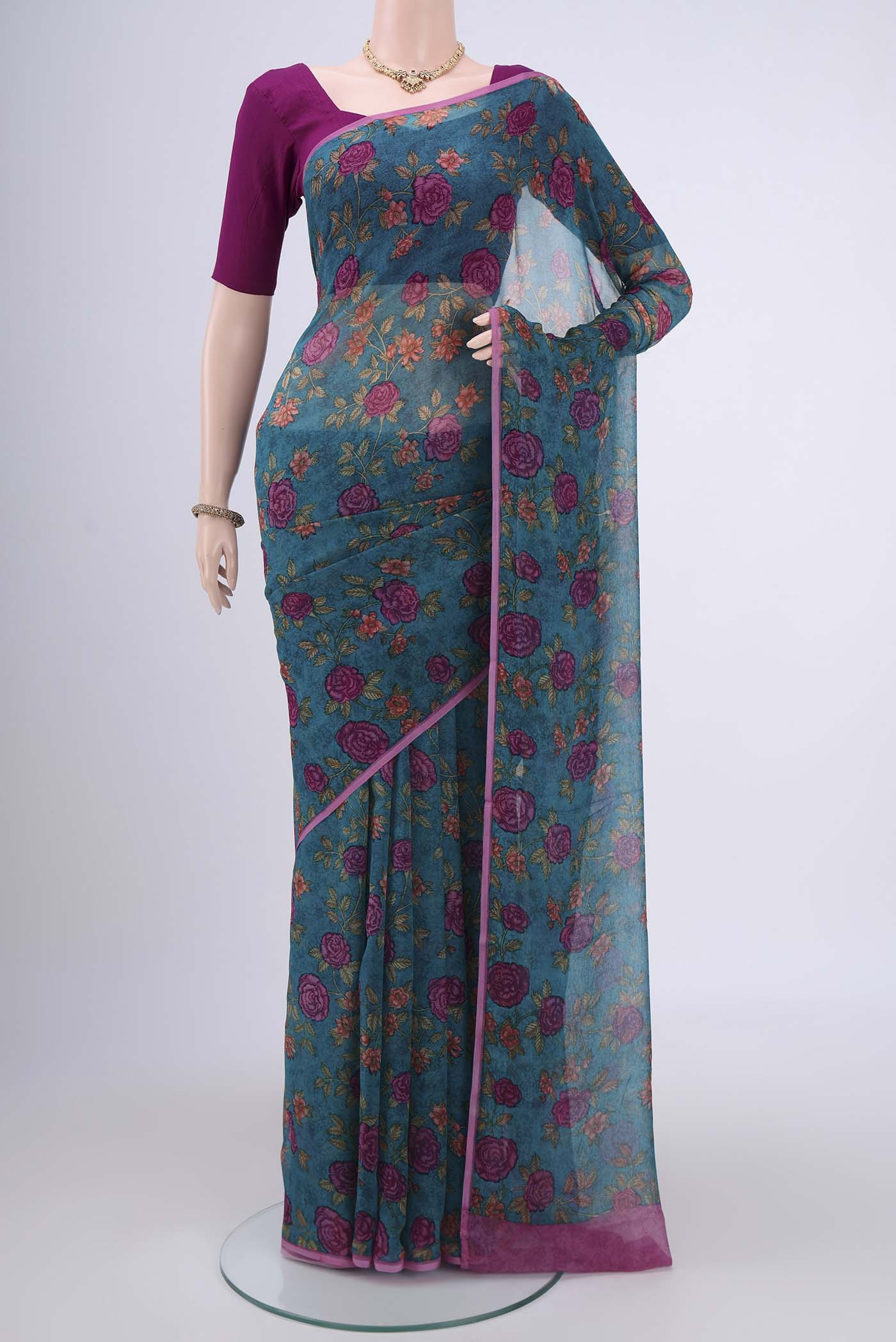 Sea Green Mysore Chiffon Saree with Floral Print on the body and Without Border.  displayed on a mannequin