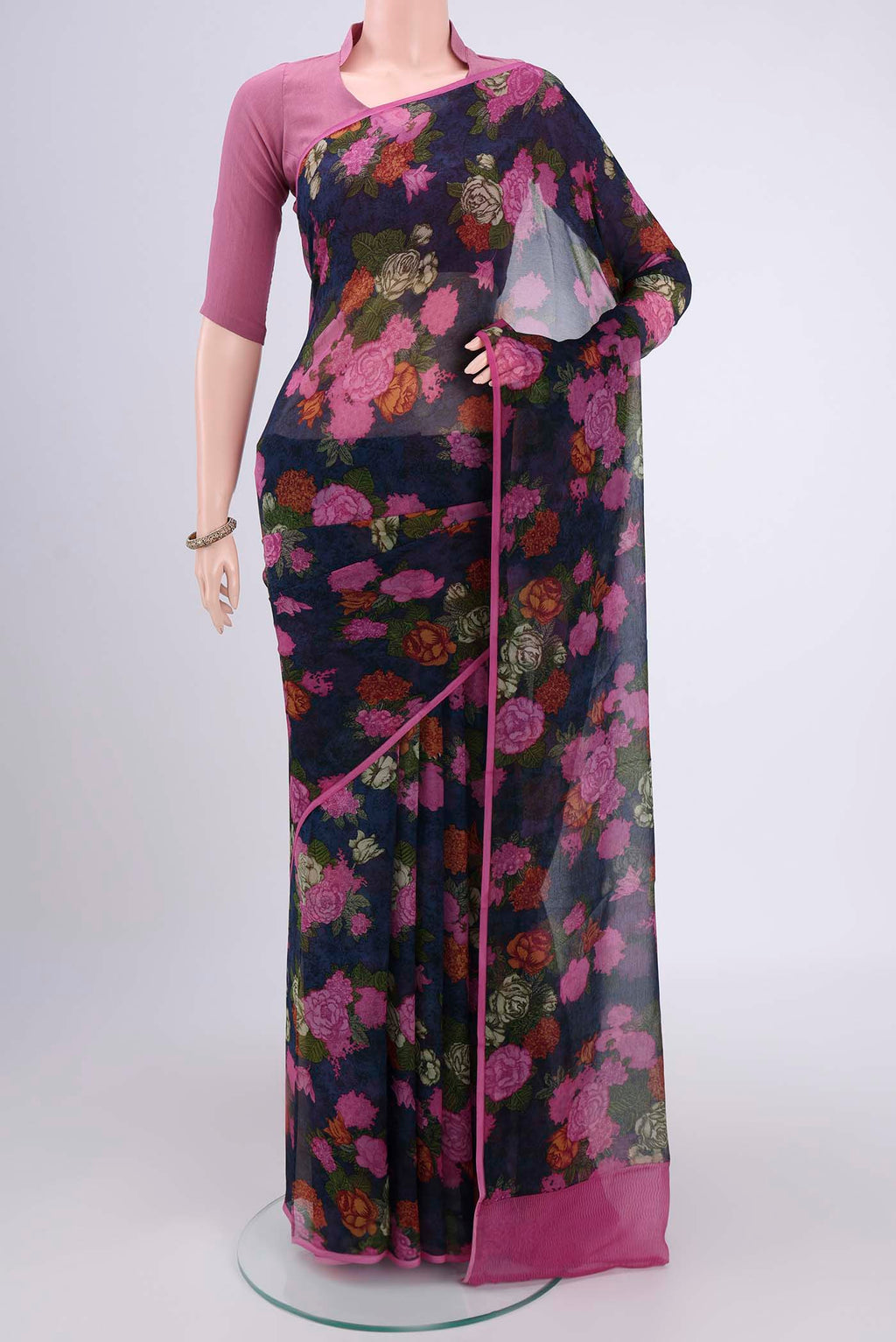Multi Color Mysore Chiffon Saree with Floral Print on the body and Satin Border.  displayed on a mannequin