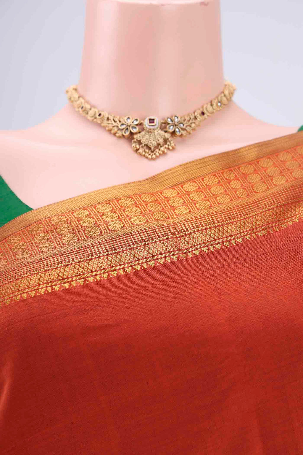 Border image of Rust Blended Poly Cotton Saree with Plain Body and Zari Border. 