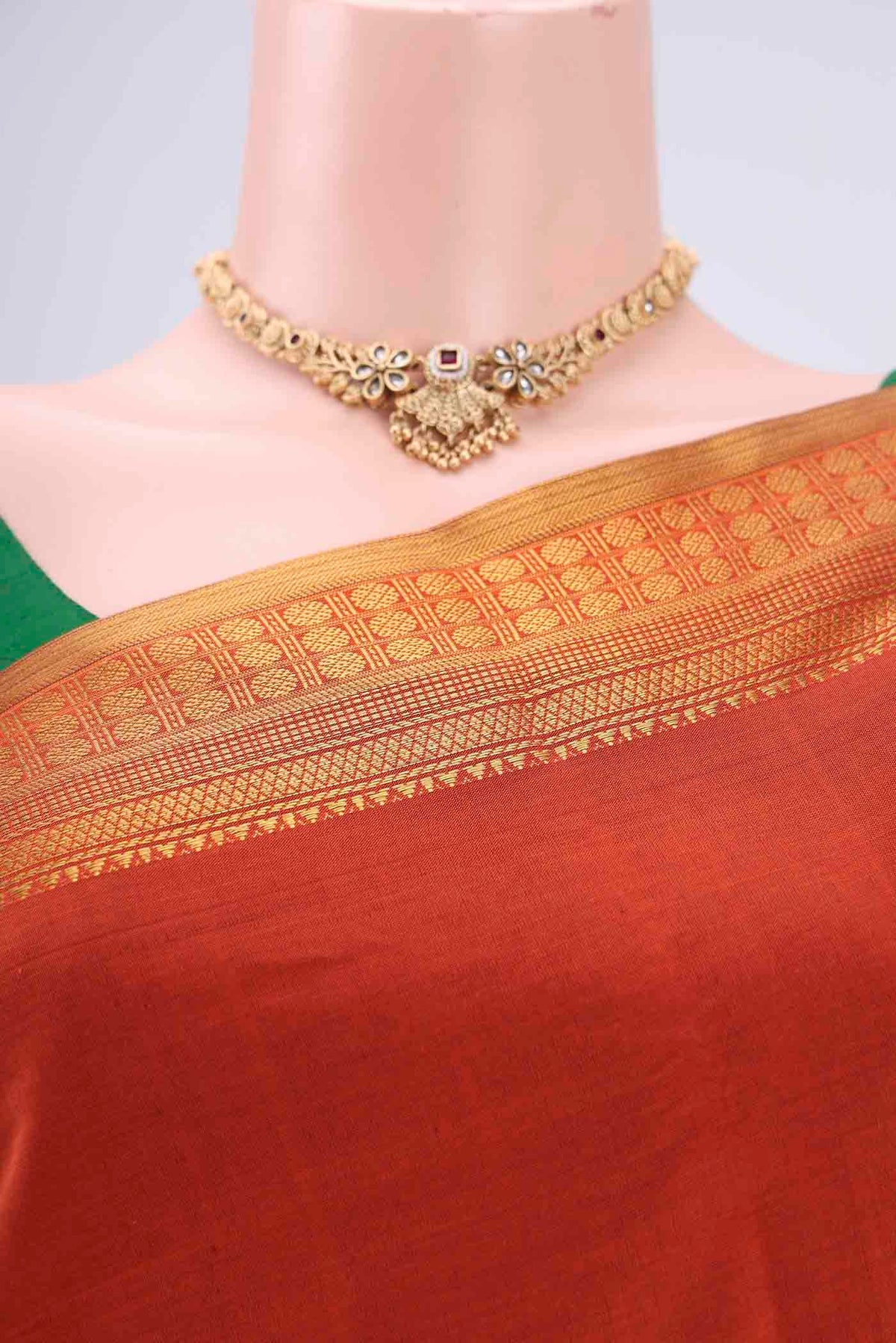 Border image of Rust Blended Poly Cotton Saree with Plain Body and Zari Border. 
