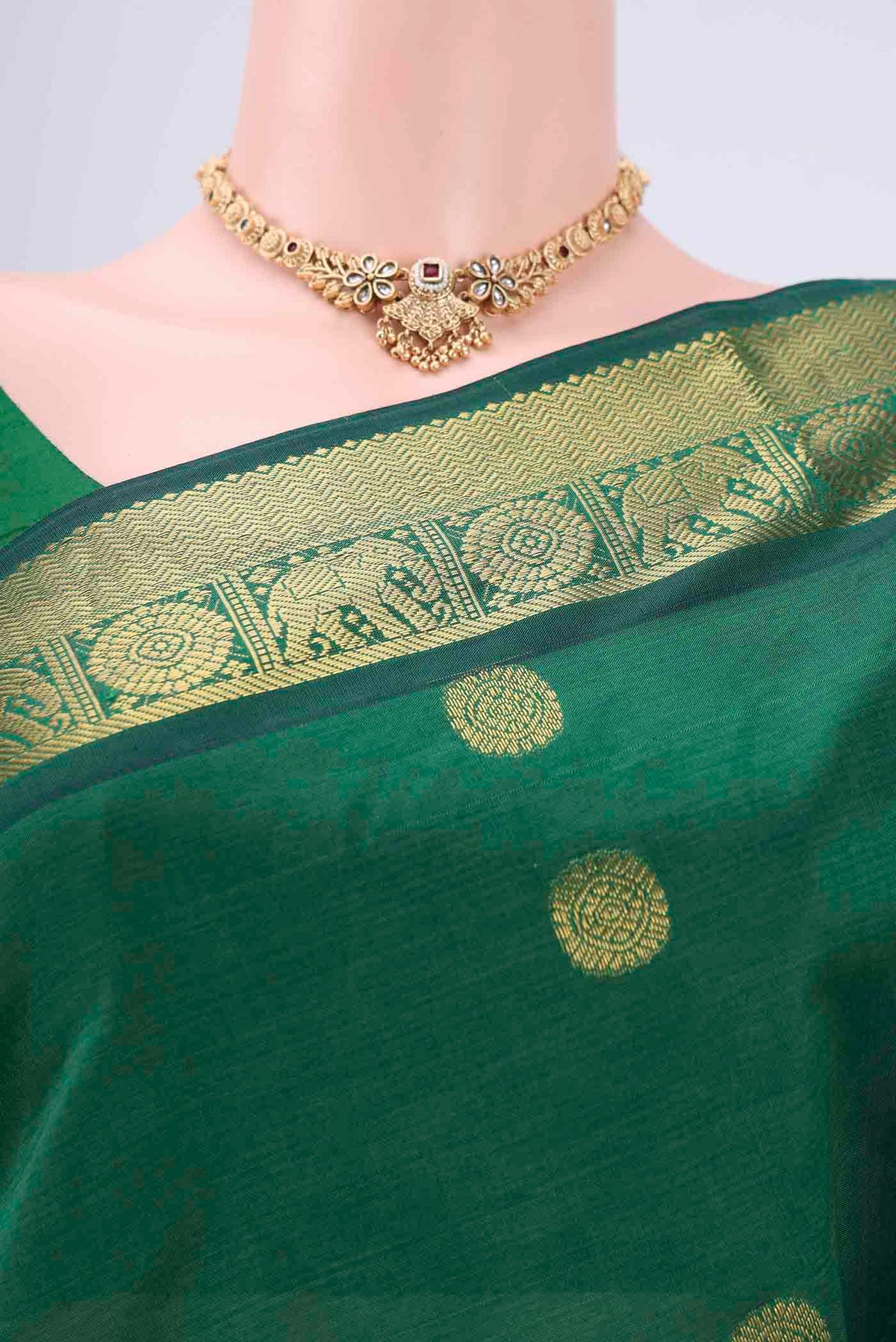 Border image of Bottle Green Blended Poly Cotton Saree with Zari Butta on the body and Zari Border. 
