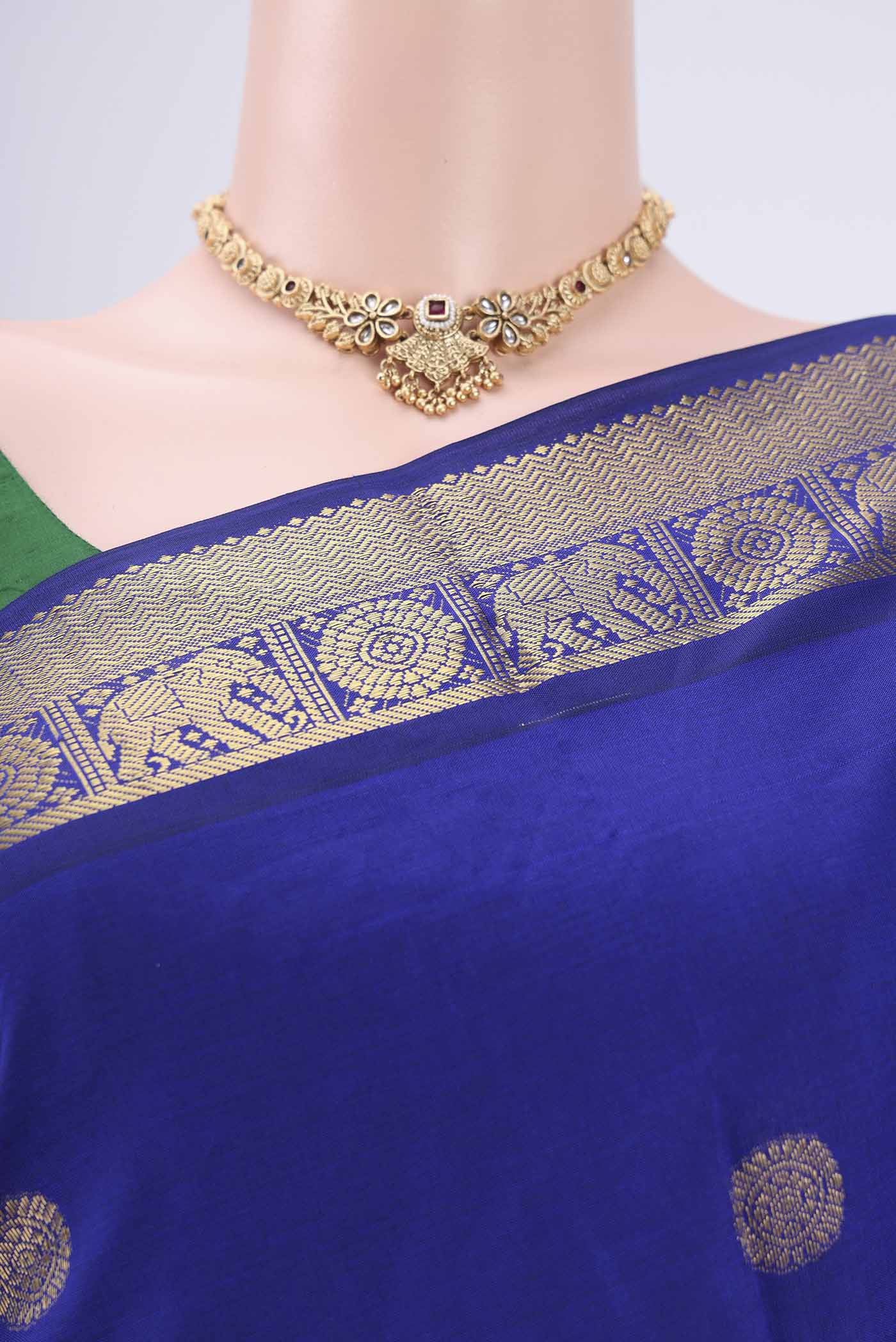 Border image of Royal Blue Blended Poly Cotton Saree with Zari Butta on the body and Zari Border. 