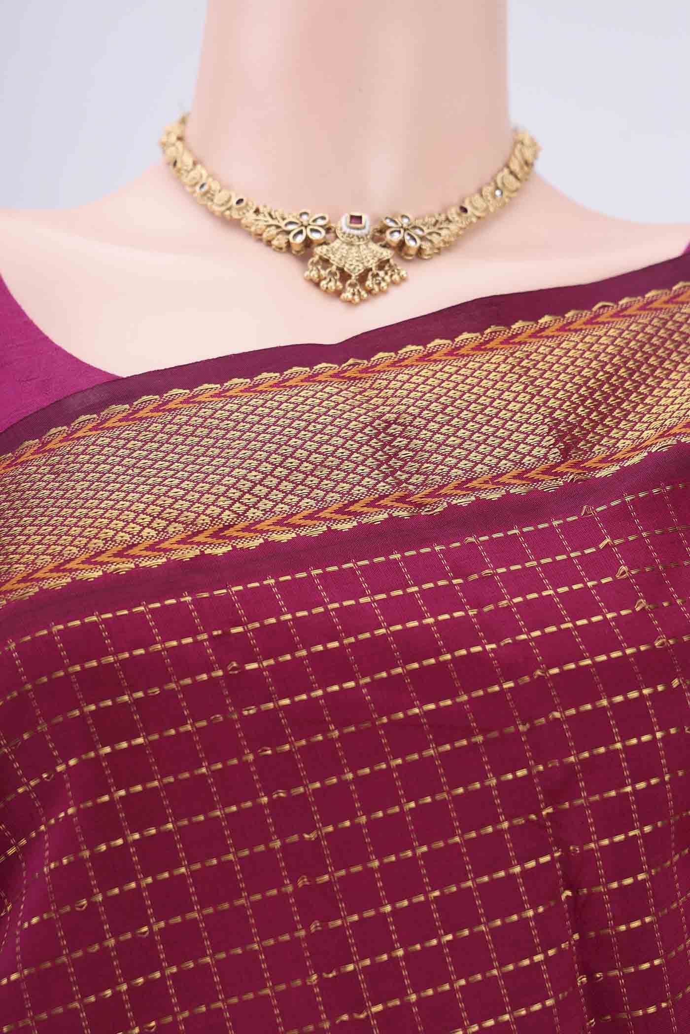 Border image of Magenta Blended Poly Cotton Saree with Checked design on the body and Zari Border. 