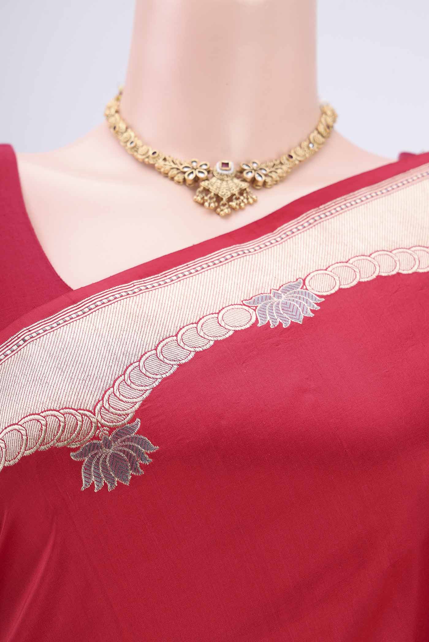 Border image of Red Banarasi Silk Saree with Zari Butta on the body and Zari Border. 