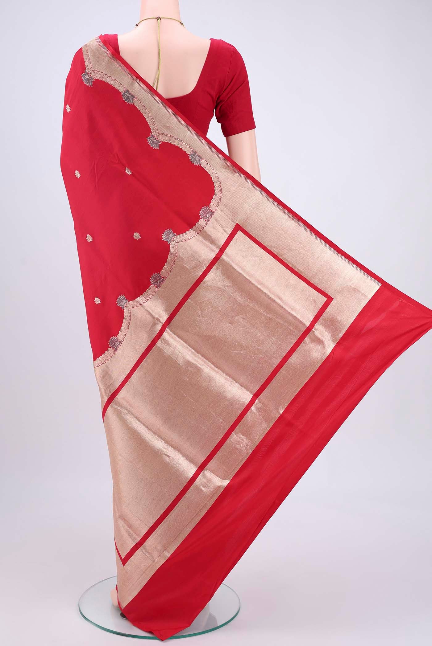 Flat view of Red Banarasi Silk Saree with Zari Butta on the body and Zari Border. 