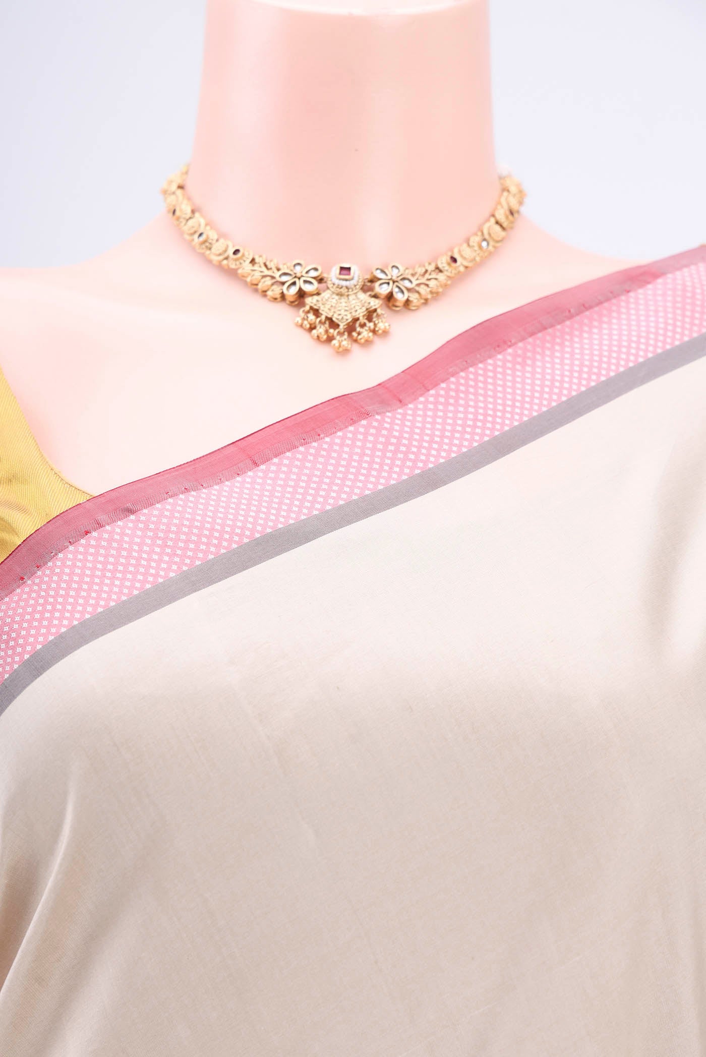 Border image of Beige Banarasi Silk Saree with Plain Body and Zari And Thread Border. 