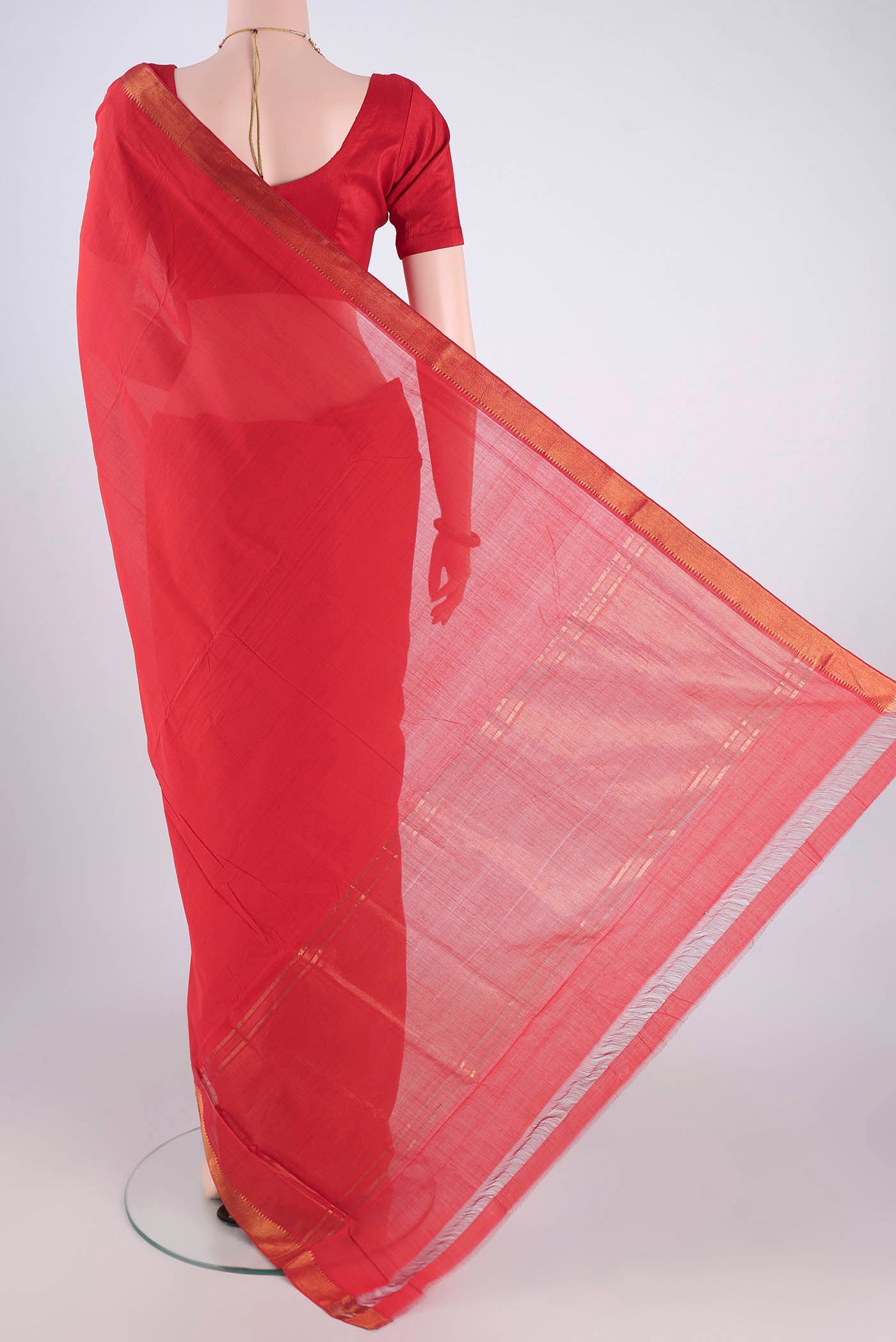 Flat view of Saffron Mangalagiri Cotton Saree with Plain Body and Zari Border. 