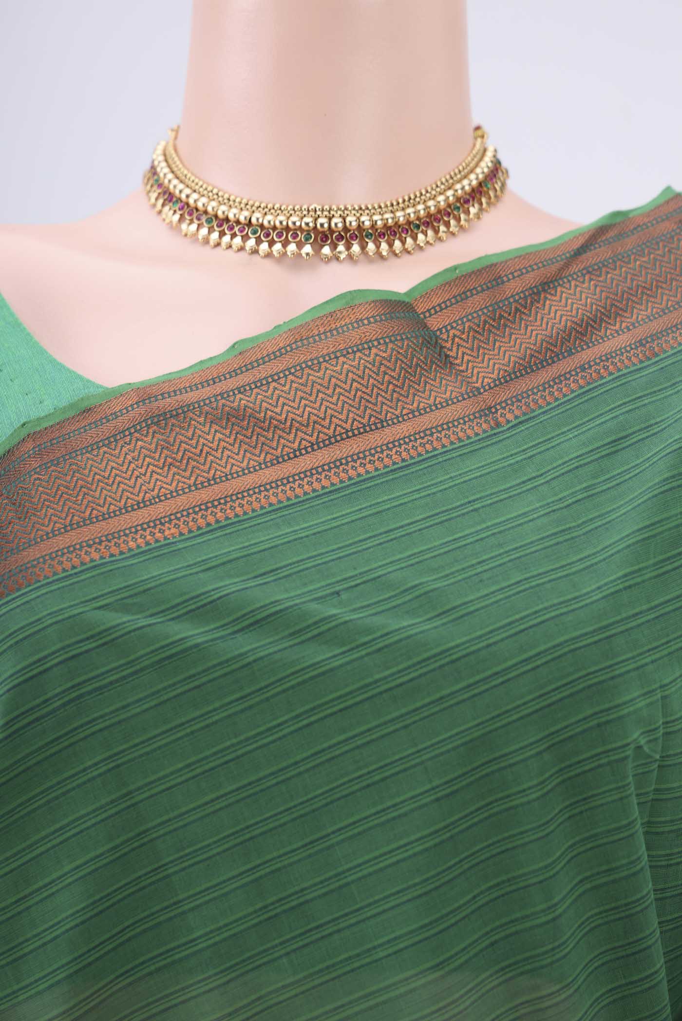 Border image of Green Mangalagiri Cotton Saree with Plain Body and Zari Border. 