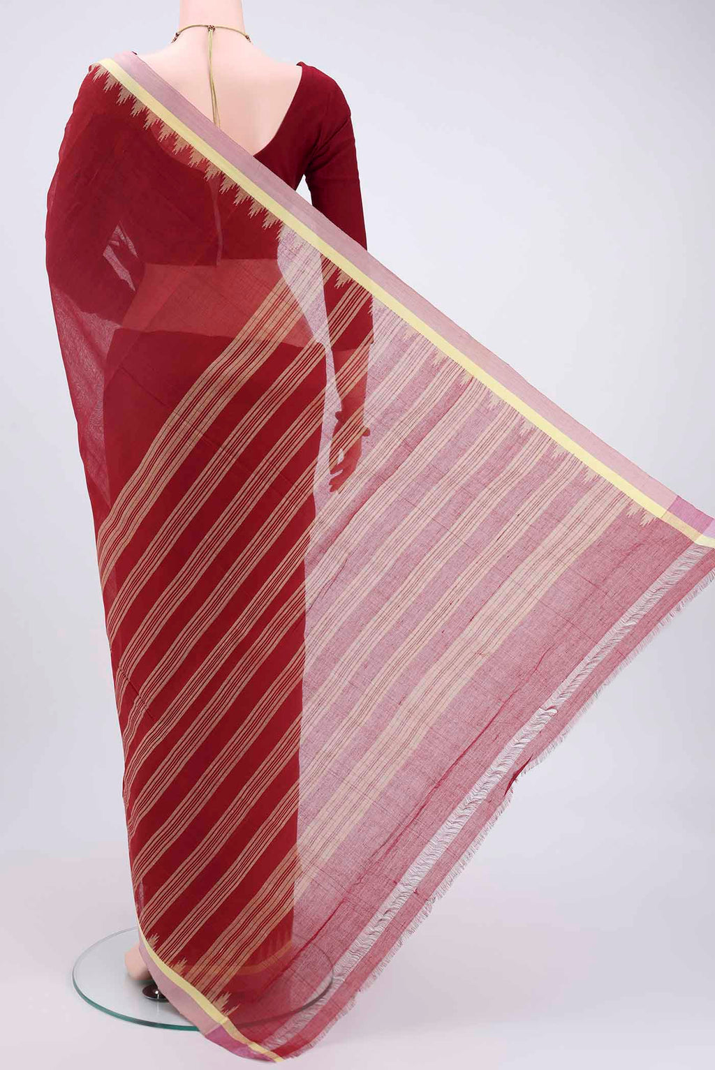 Flat view of Maroon Mangalagiri Cotton Saree with Plain Body and Zari Border. 