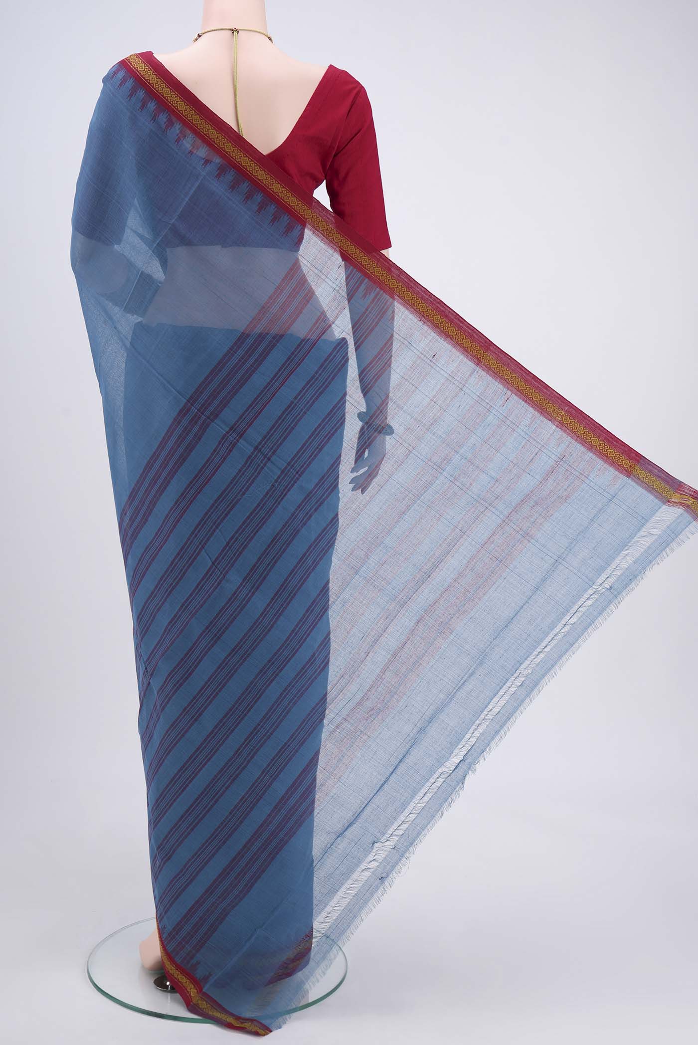 Flat view of Light Blue Mangalagiri Cotton Saree with Plain Body and Thread Border. 