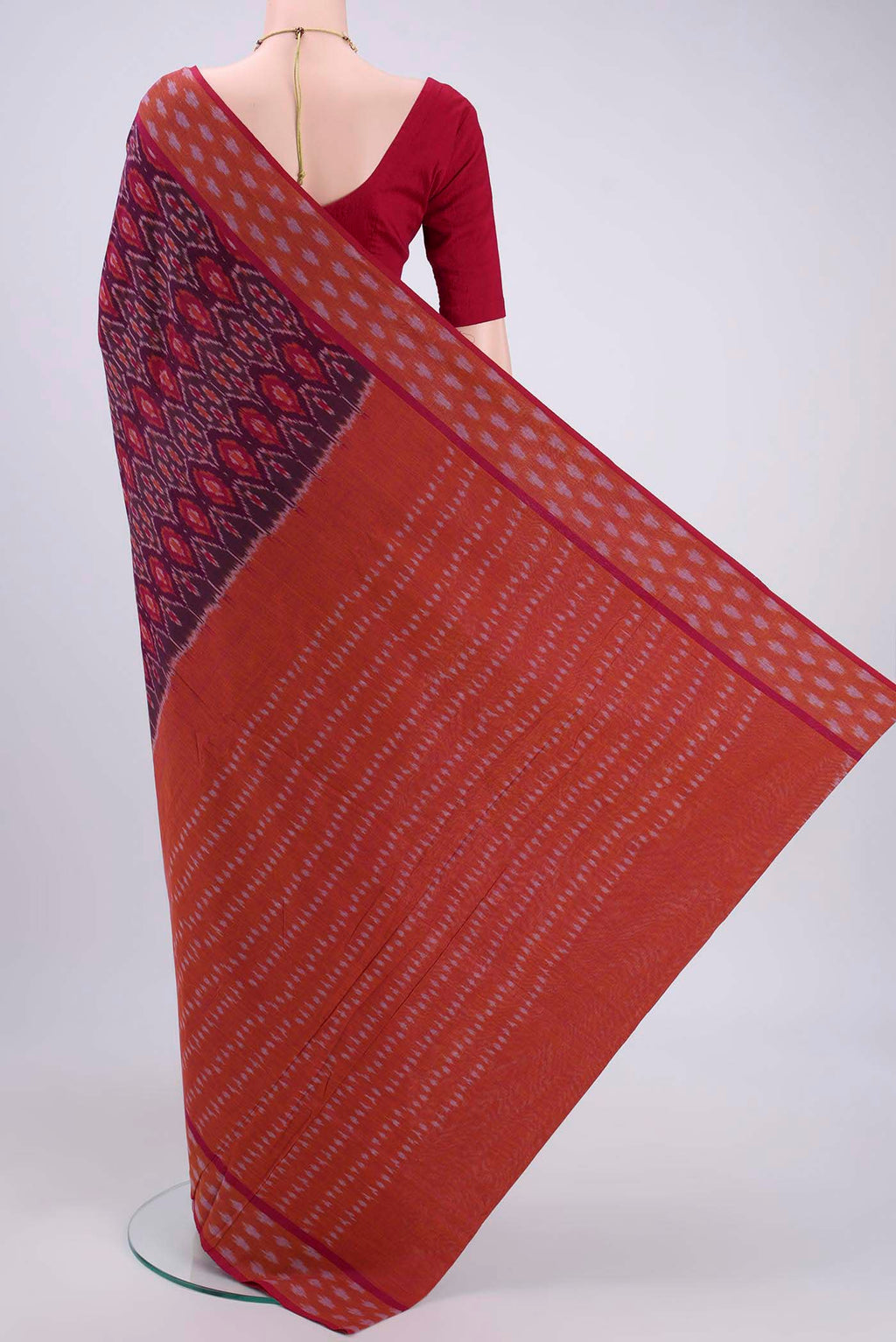 Flat view of Magenta Dual Tone Pochampally Cotton Saree with Ikat design on the body and Ikat Border. 