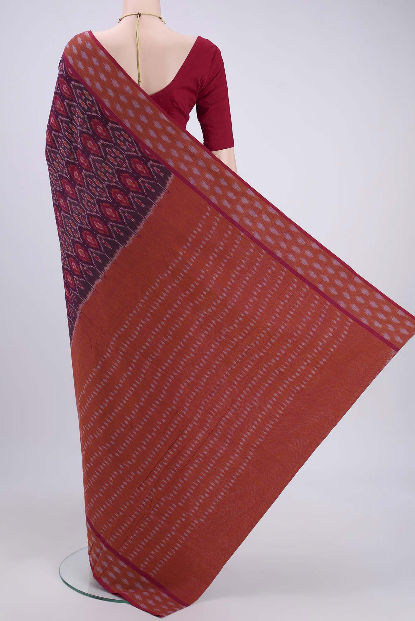 Flat view of Magenta Dual Tone Pochampally Cotton Saree with Ikat design on the body and Ikat Border. 