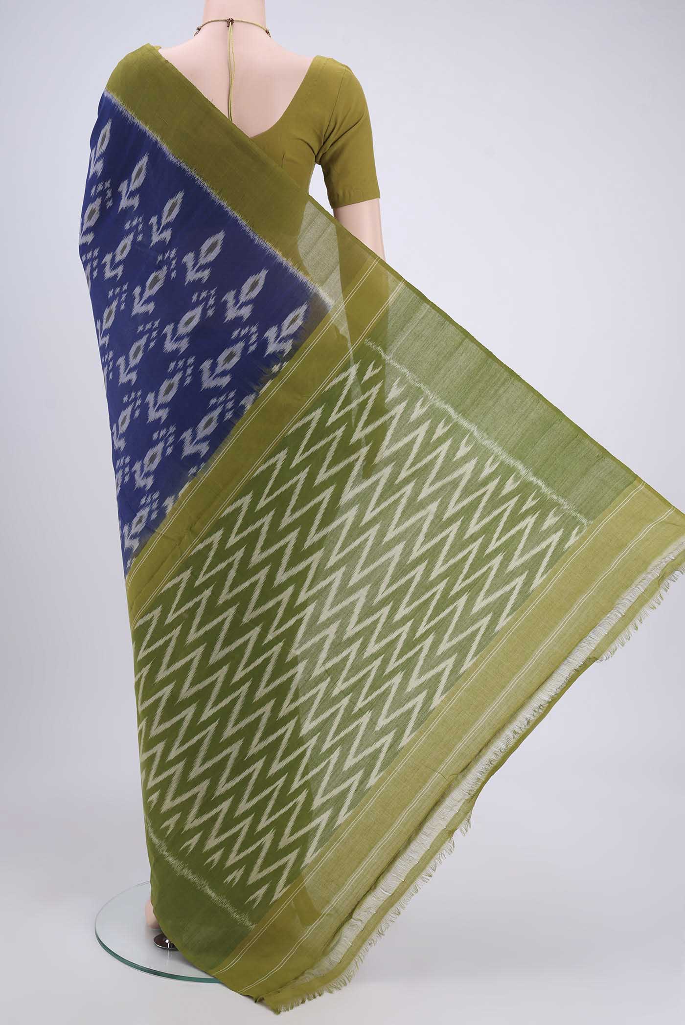 Flat view of Royal Blue Dual Tone Pochampally Cotton Saree with Ikat design on the body and Ikat Border. 
