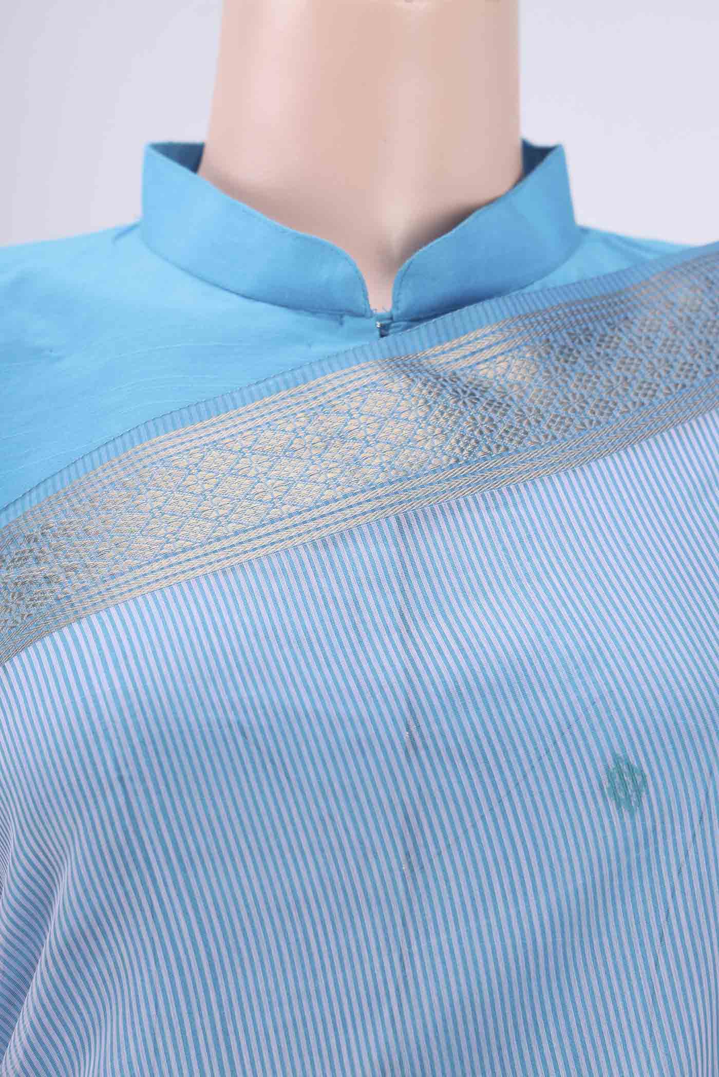 Border image of Lilac Maheshwari Silk Cotton Saree with Zari And Thread Butta on the body and Zari Border. 