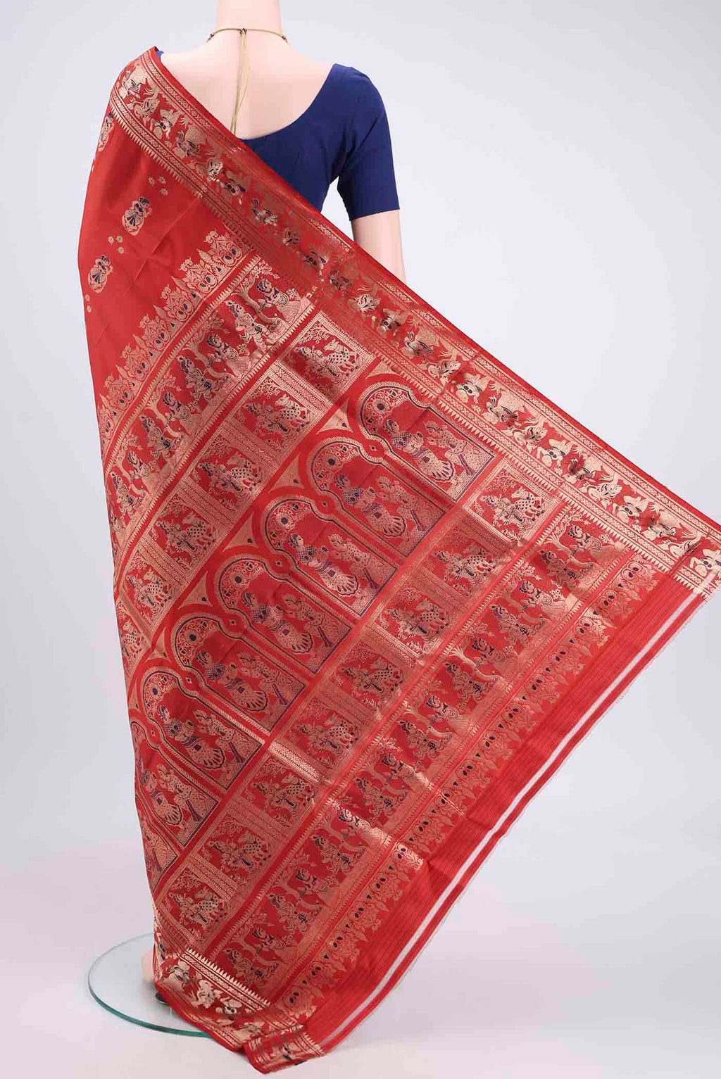 Flat view of Rust Baluchari Silk Saree with Zari And Thread Butta on the body and Zari And Thread Border. 