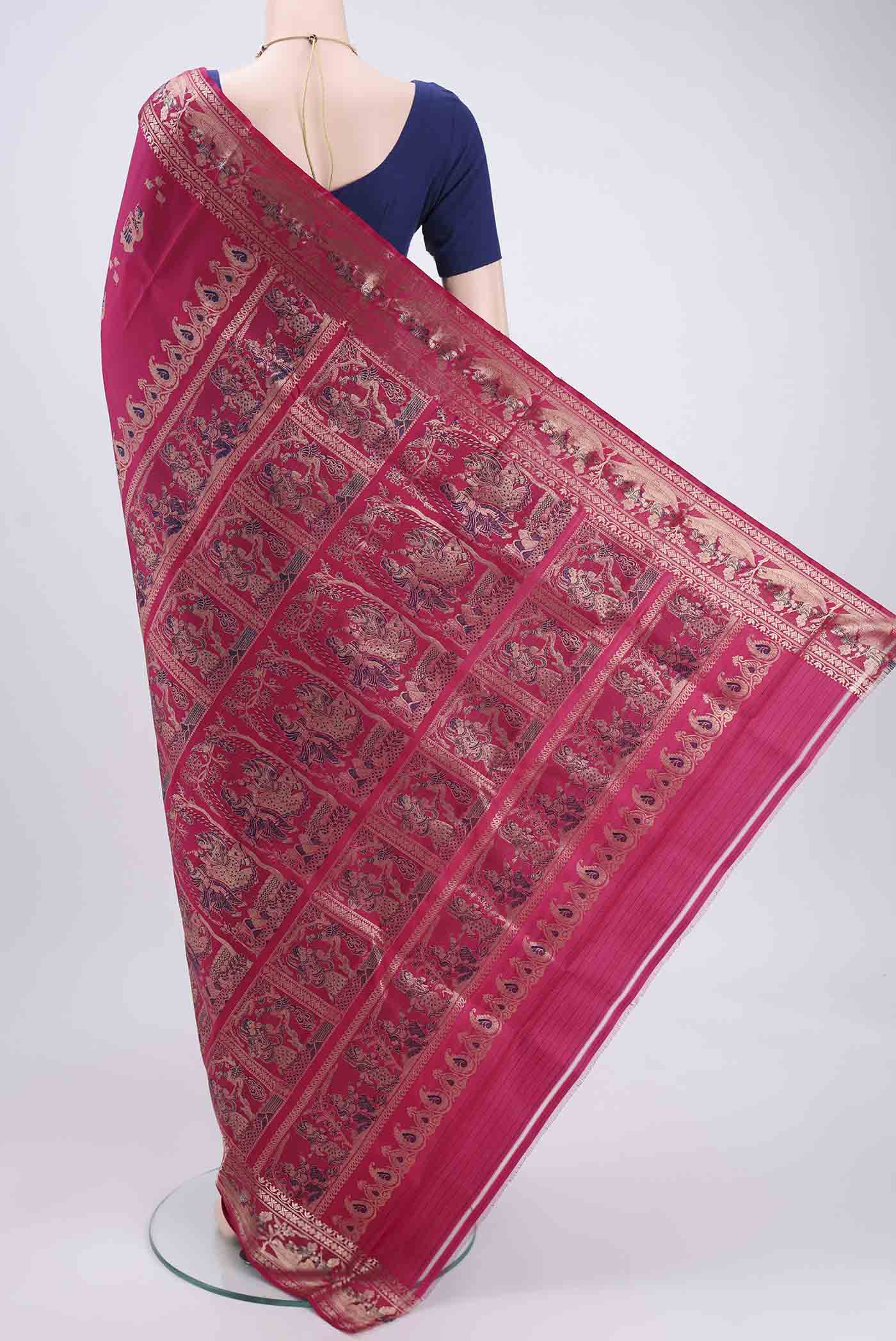 Flat view of Rani Pink Baluchari Silk Saree with Zari And Thread Butta on the body and Zari And Thread Border. 