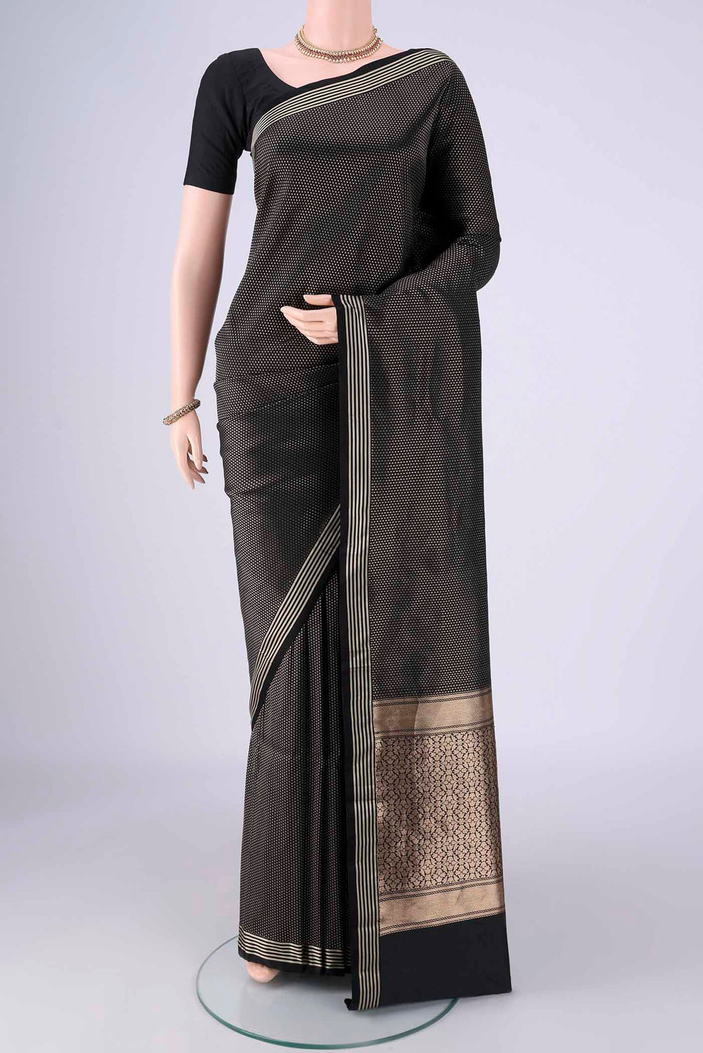 Black Banarasi Silk Saree with Zari Brocade on the body and Plain Border.  displayed on a mannequin