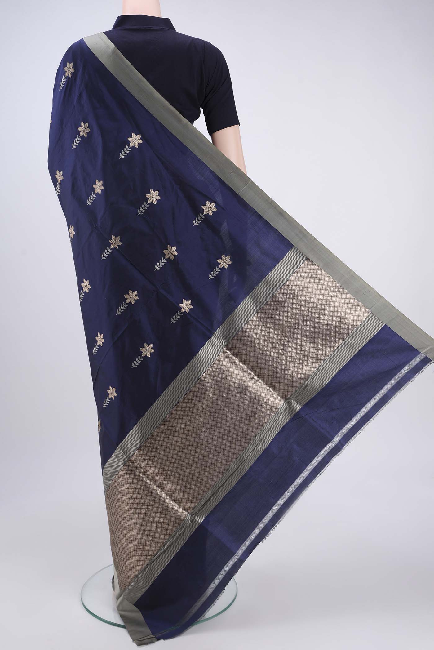 Flat view of Blue Banarasi Silk Saree with Zari Butta on the body and Zari Border. 