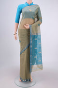 Sage Green Maheshwari Silk Cotton Saree with Zari And Thread Butta on the body and Zari And Thread Border.  displayed on a mannequin