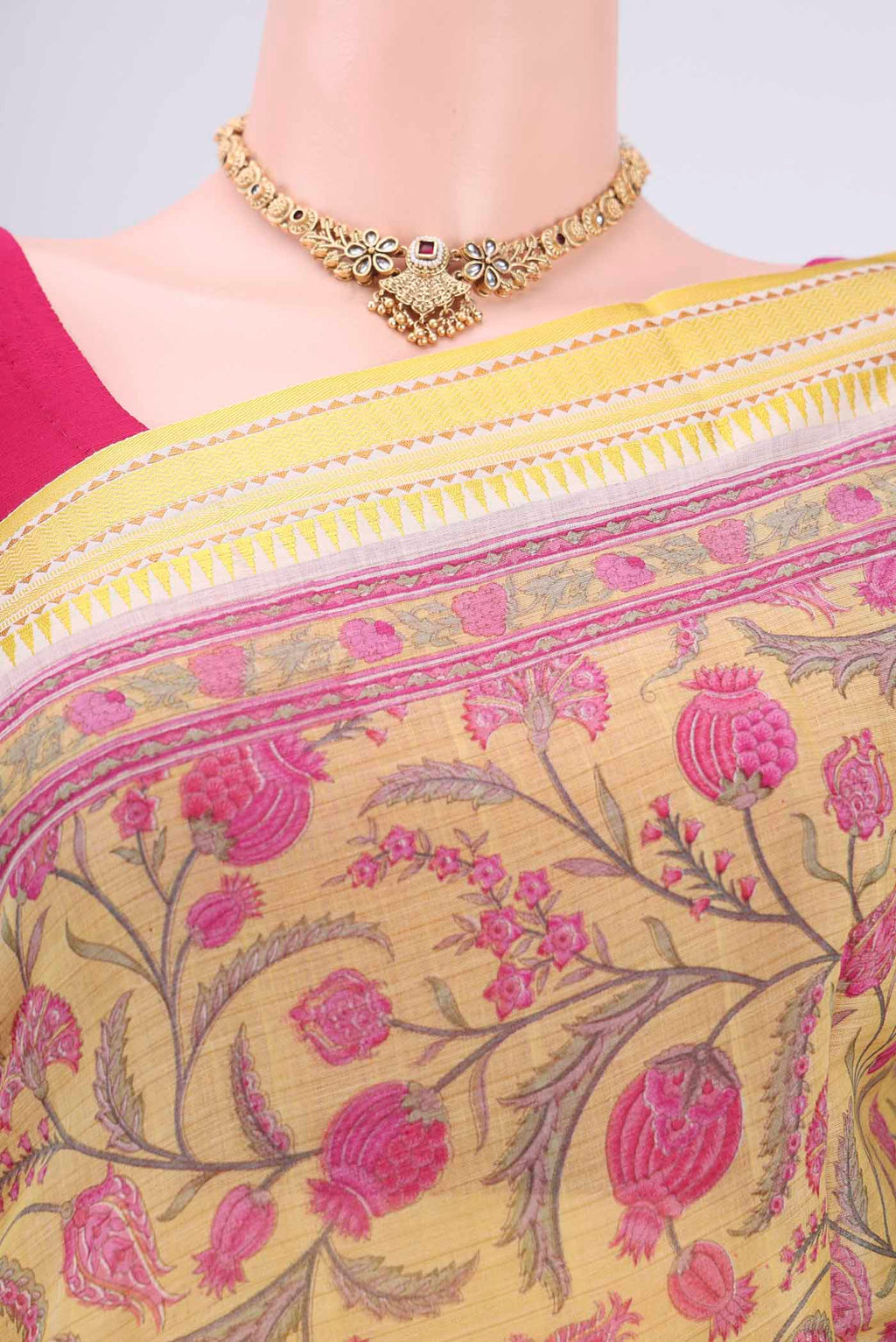 Border image of Lemon Yellow Tussar Silk Saree with Floral Print on the body and Thread Border. 