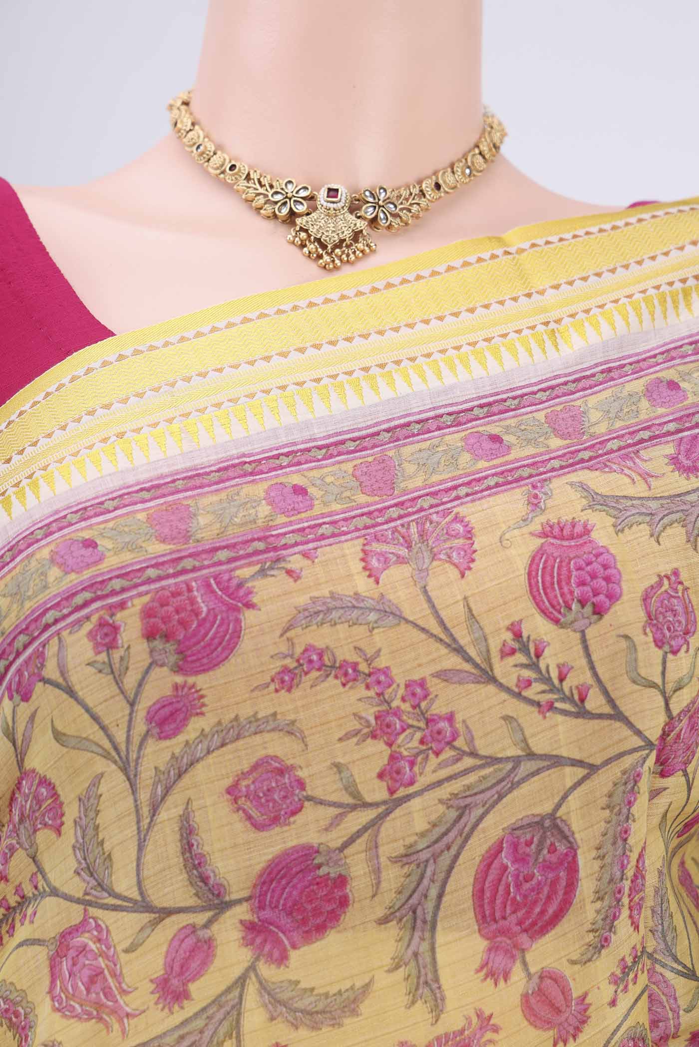 Border image of Lemon Yellow Tussar Silk Saree with Floral Print on the body and Thread Border. 