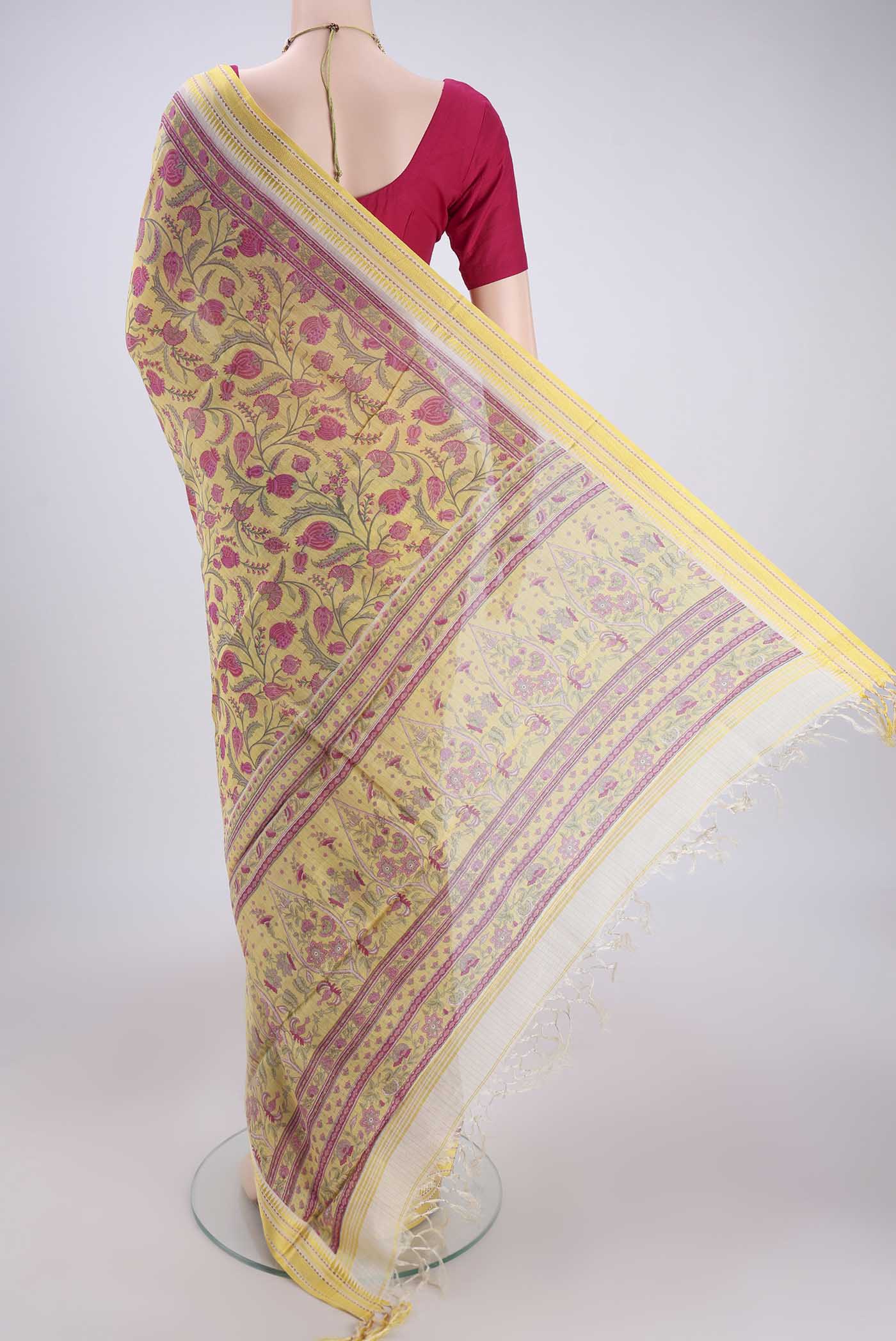 Flat view of Lemon Yellow Tussar Silk Saree with Floral Print on the body and Thread Border. 