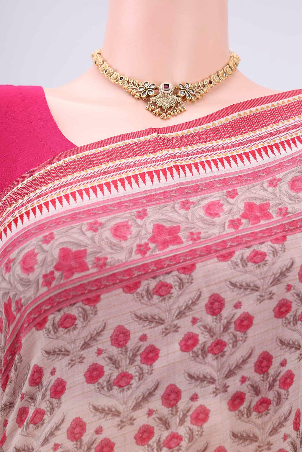 Border image of Beige Tussar Silk Saree with Floral Print on the body and Thread Border. 