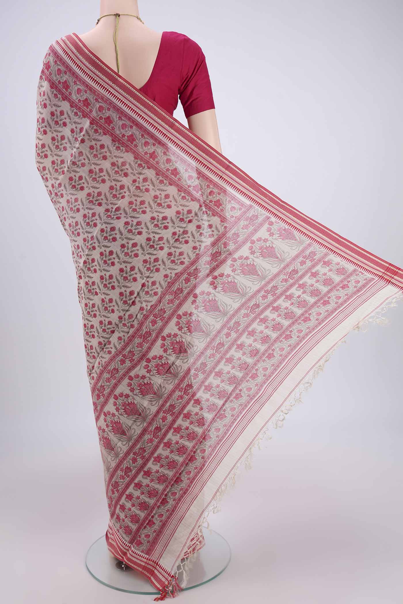 Flat view of Beige Tussar Silk Saree with Floral Print on the body and Thread Border. 