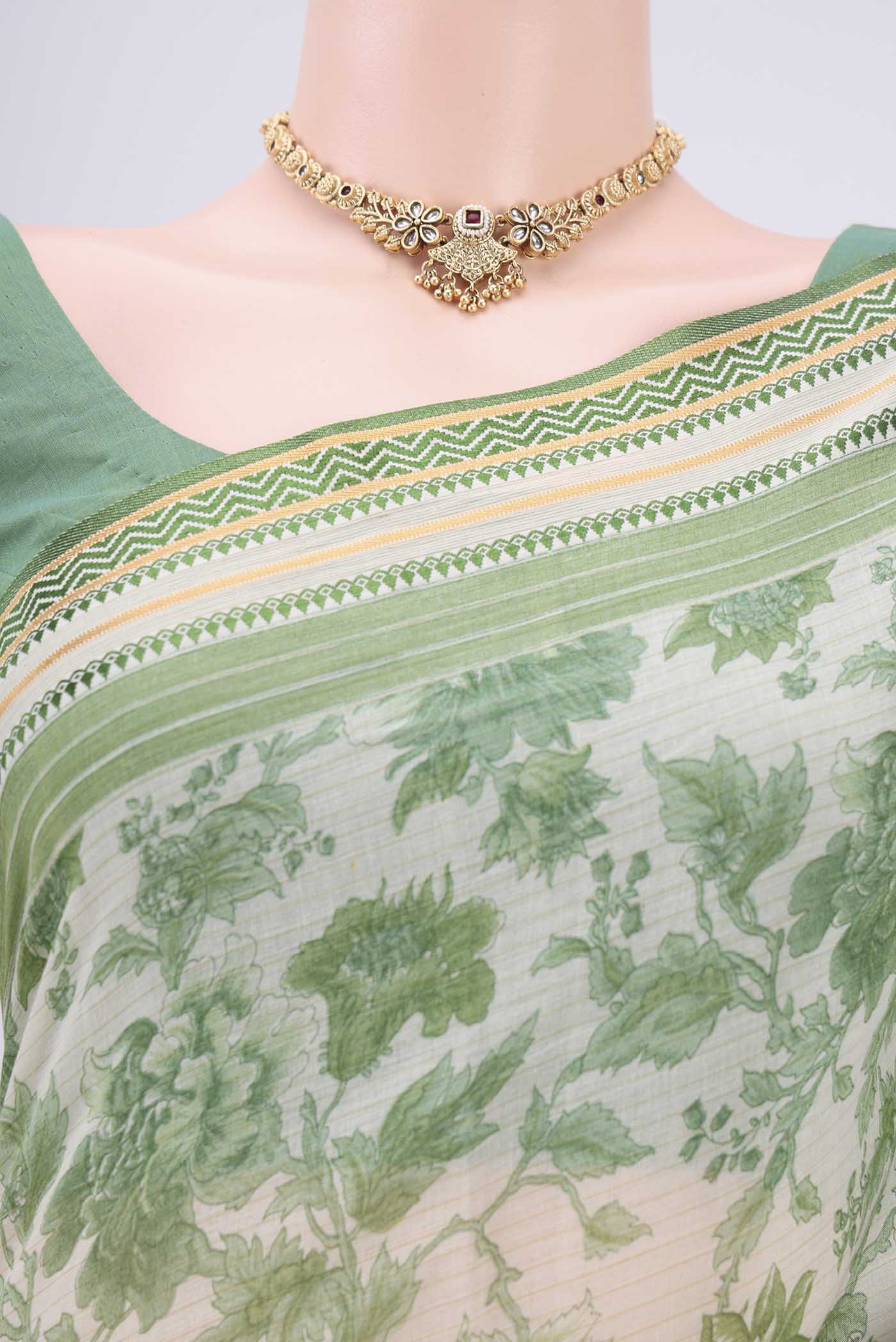 Border image of Off White Tussar Silk Saree with Floral Print on the body and Thread Border. 