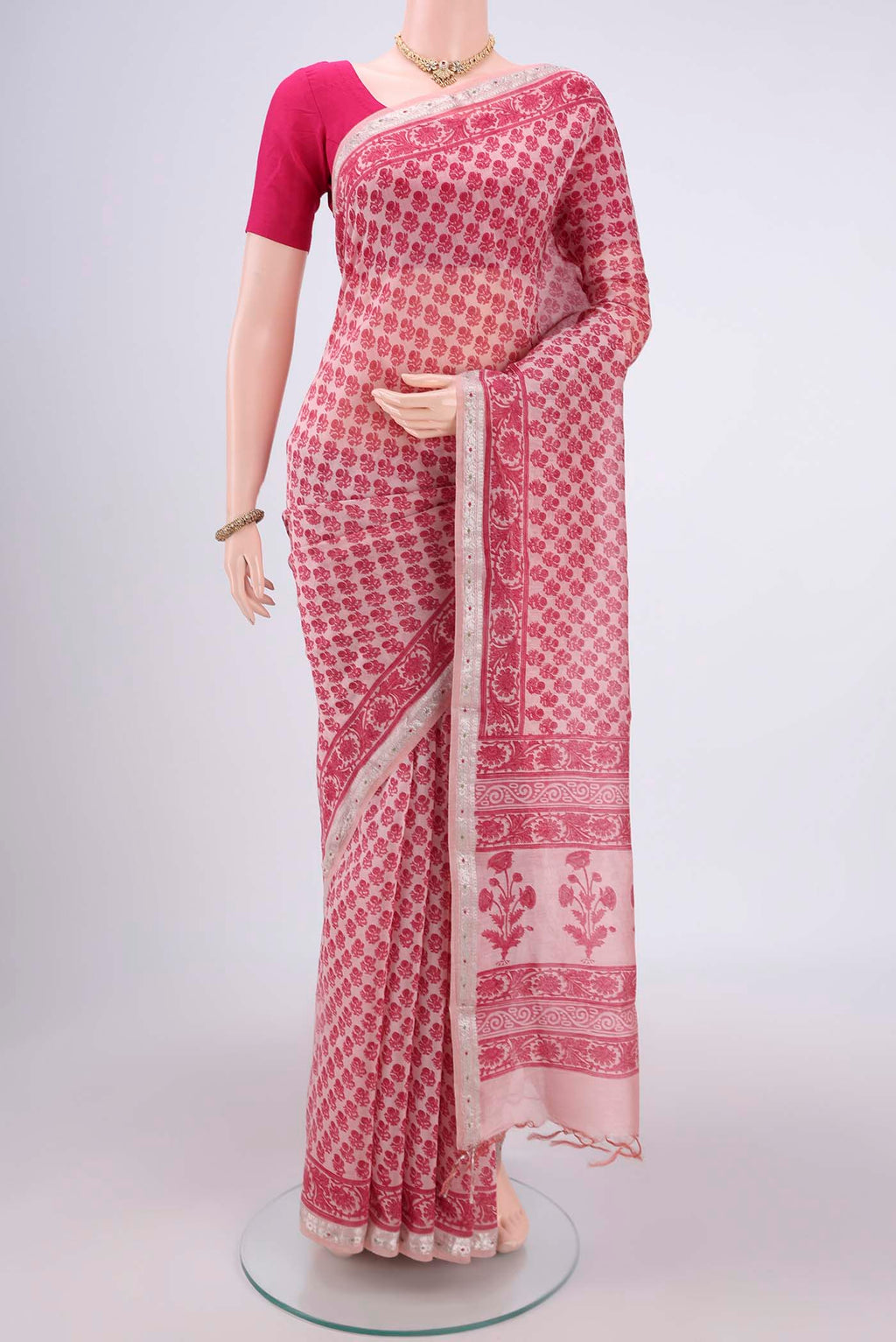 Rose pink Chanderi Silk Saree with Floral Print on the body and Zari Border.  displayed on a mannequin