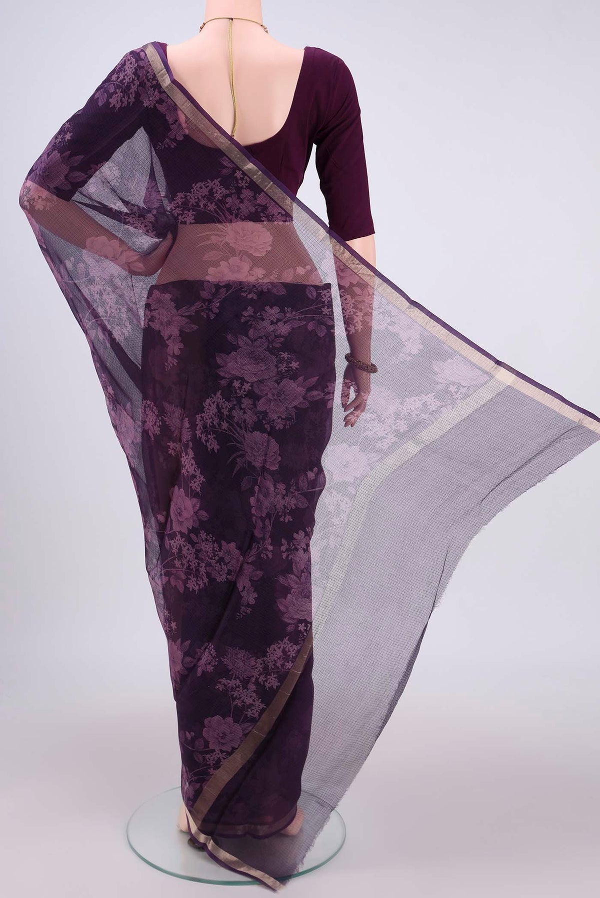Flat view of Purple Kota Silk Saree with Floral Print on the body and Zari Border. 