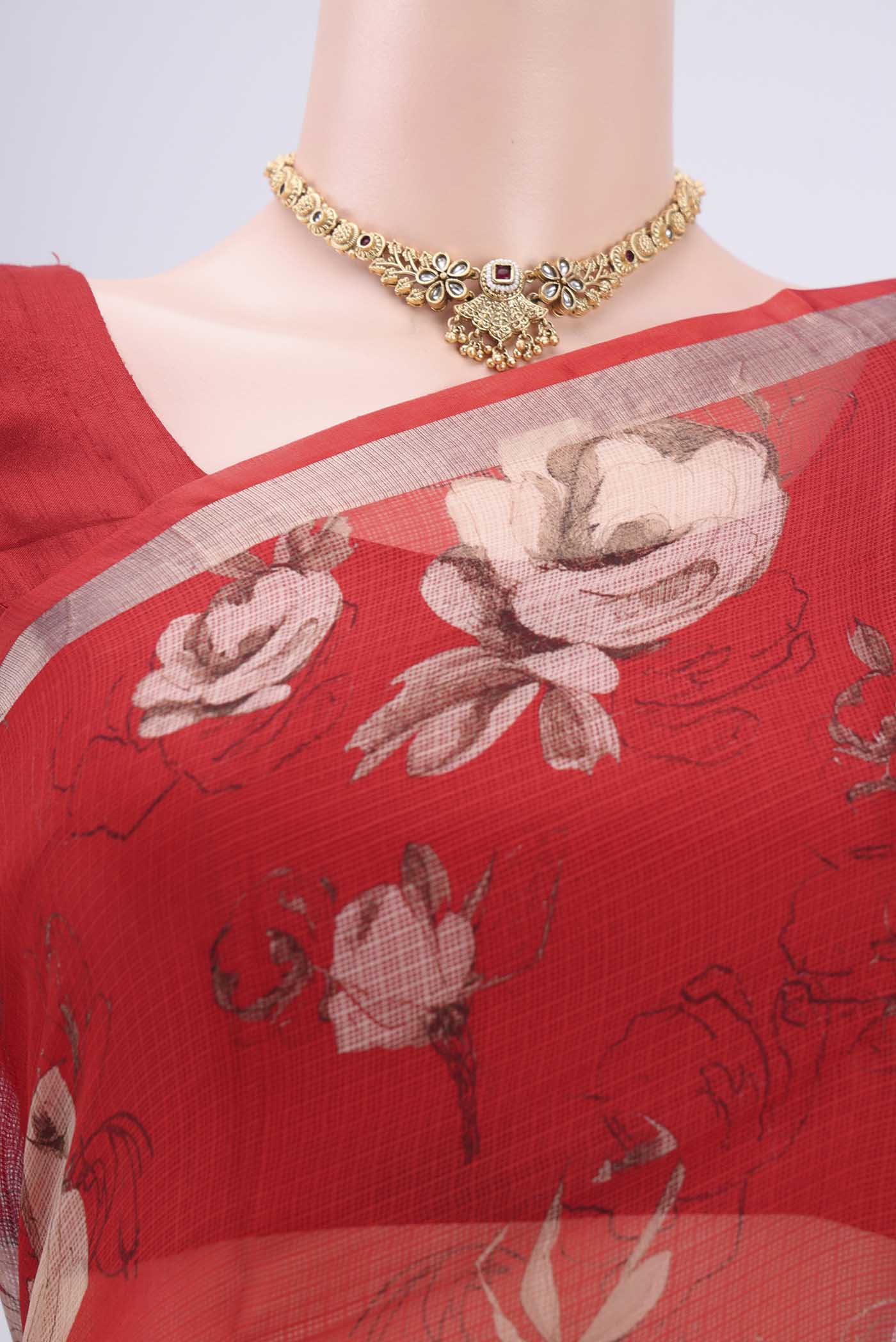 Border image of Red Kota Silk Saree with Floral Print on the body and Zari Border. 