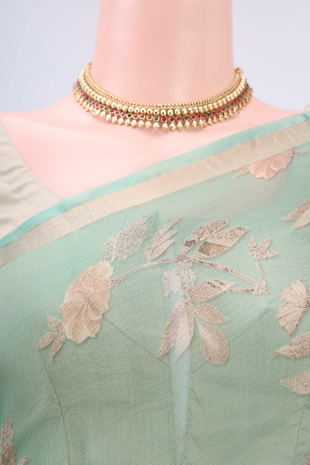 Border image of Sage Green Kota Silk Saree with Printed design on the body and Zari Border. 
