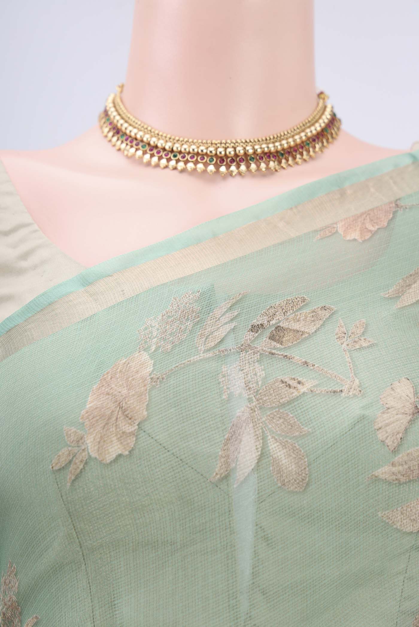 Border image of Sage Green Kota Silk Saree with Printed design on the body and Zari Border. 
