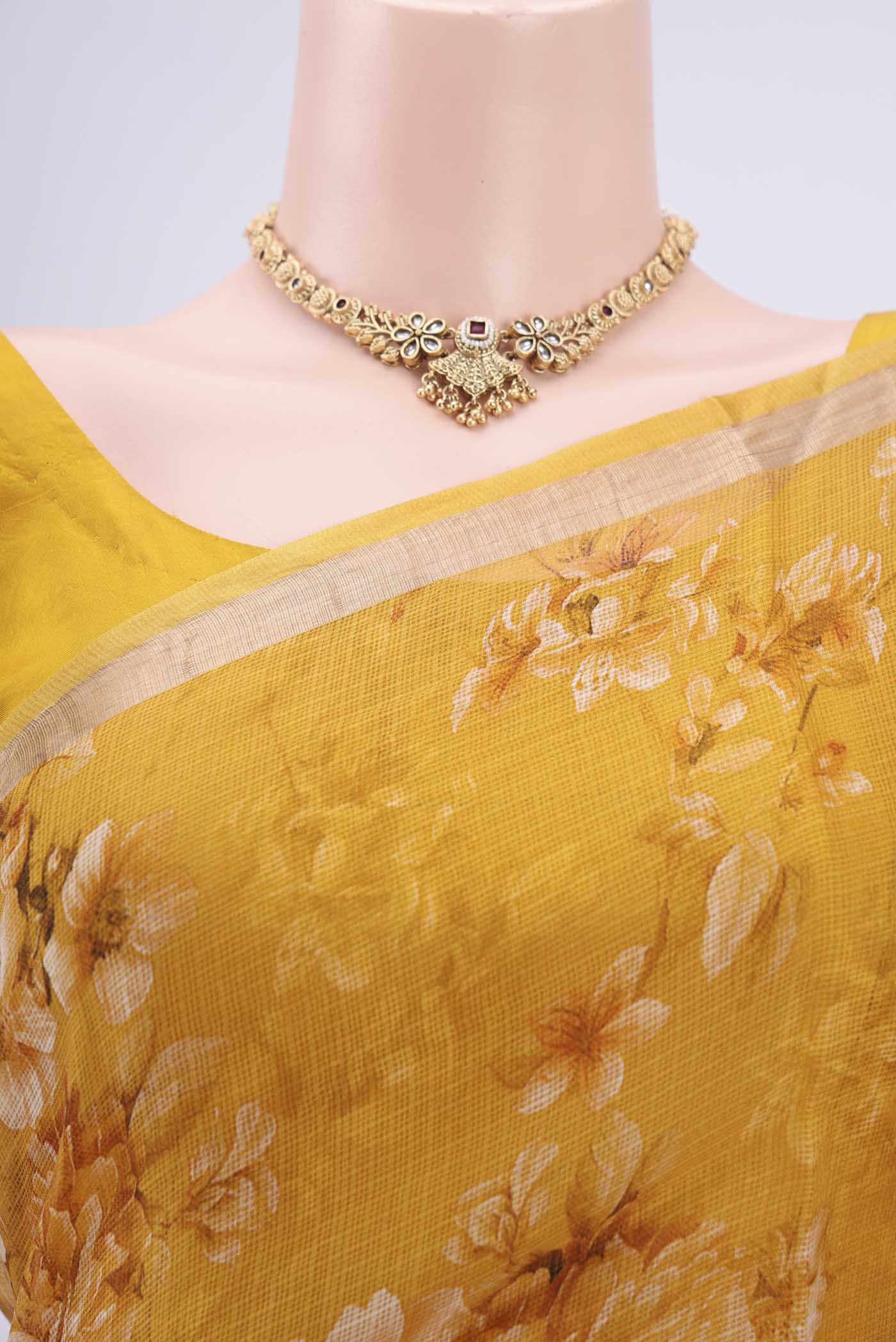 Border image of Mustard Kota Silk Saree with Printed design on the body and Zari Border. 