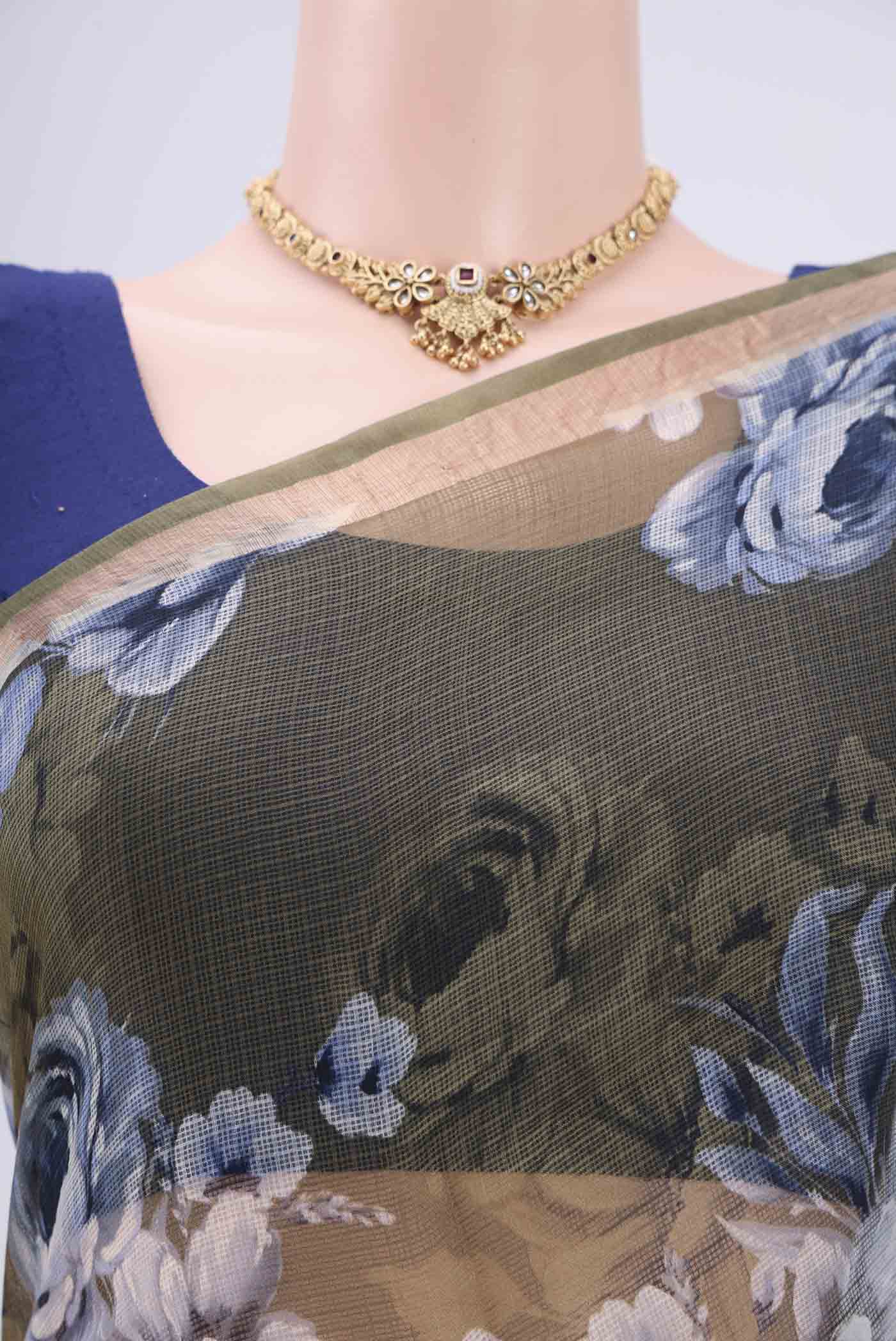 Border image of Mehandi Green Kota Silk Saree with Printed design on the body and Zari Border. 