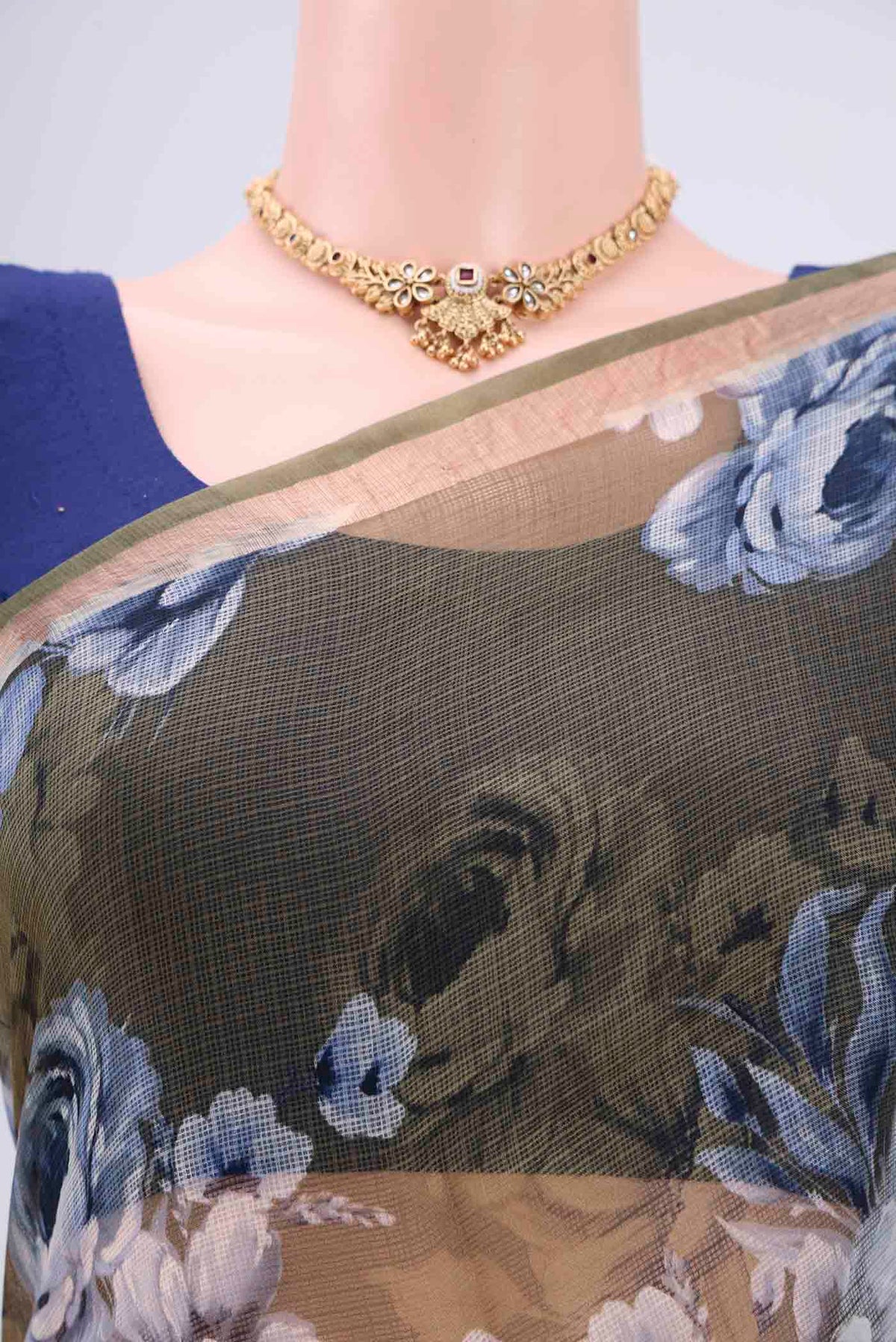 Border image of Mehandi Green Kota Silk Saree with Printed design on the body and Zari Border. 
