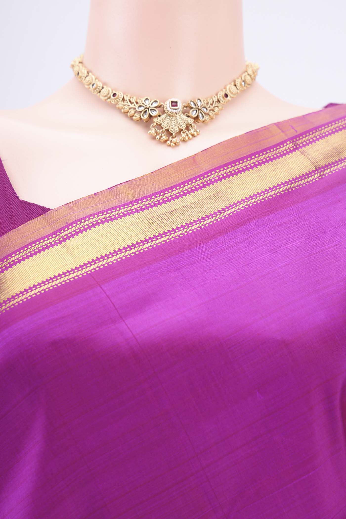 Border image of Magenta Kanjivaram Silk Saree with Plain Body and Zari Border. 