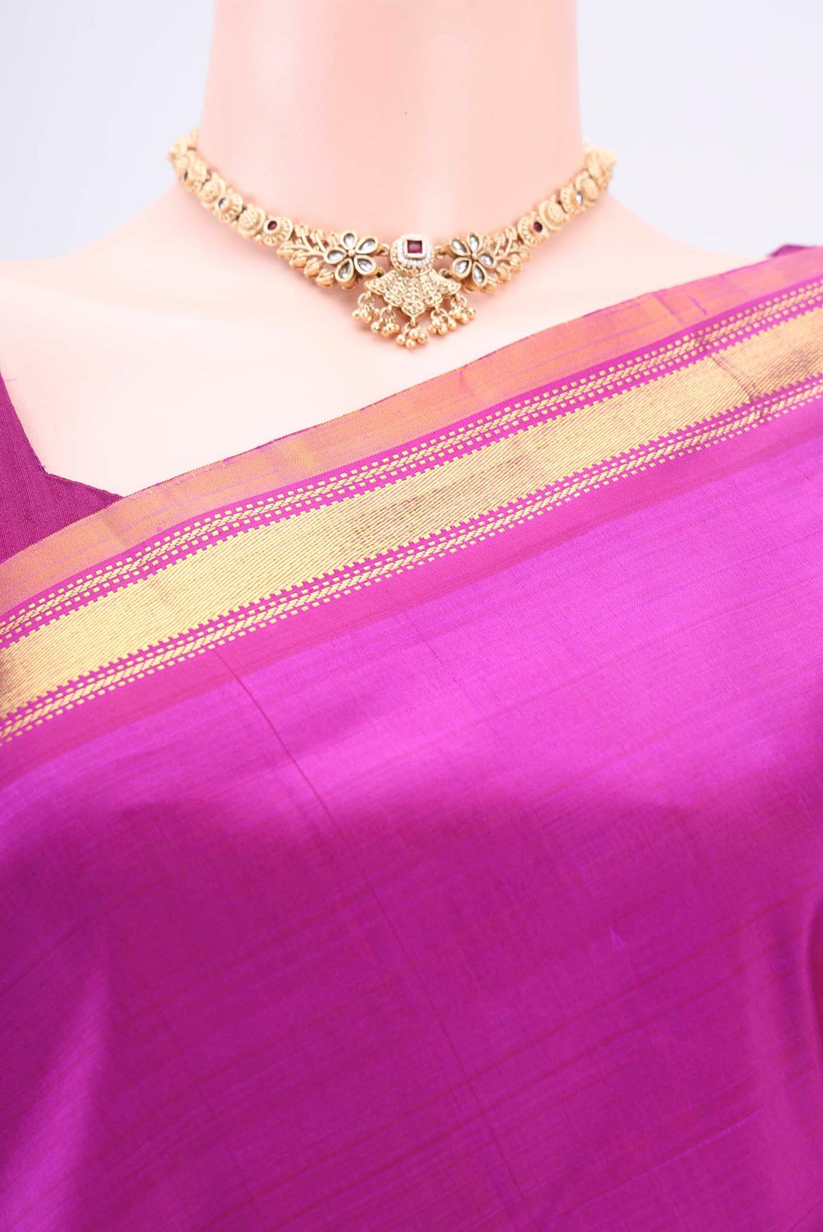 Border image of Magenta Kanjivaram Silk Saree with Plain Body and Zari Border. 