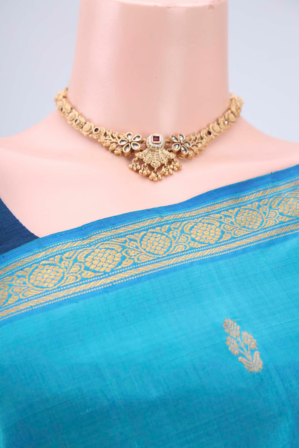 Border image of Blue Kanjivaram Silk Saree with Zari Butta on the body and Zari Border. 