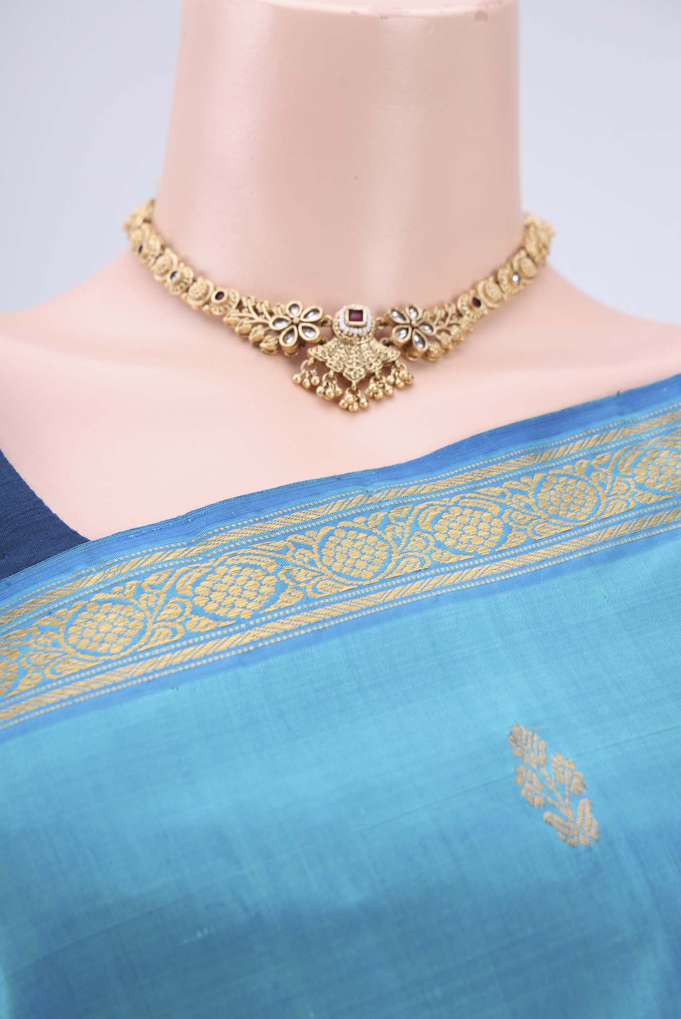 Border image of Blue Kanjivaram Silk Saree with Zari Butta on the body and Zari Border. 