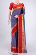 Mauve Dual Tone Kanjivaram Silk Saree with Checked design on the body and Zari Border.  displayed on a mannequin