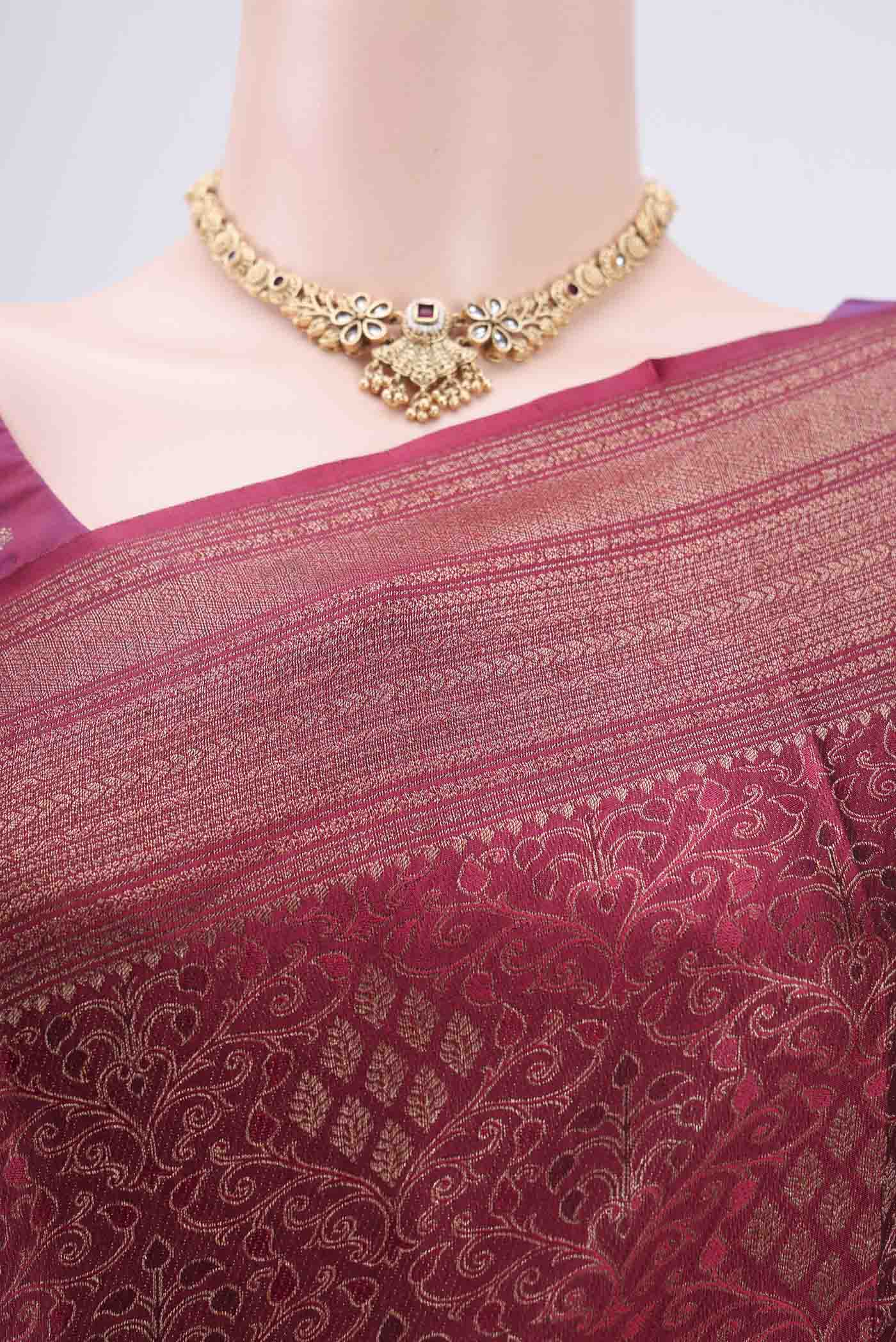 Border image of Maroon Mysore Crepe Saree with Zari Brocade on the body and Zari Border. 