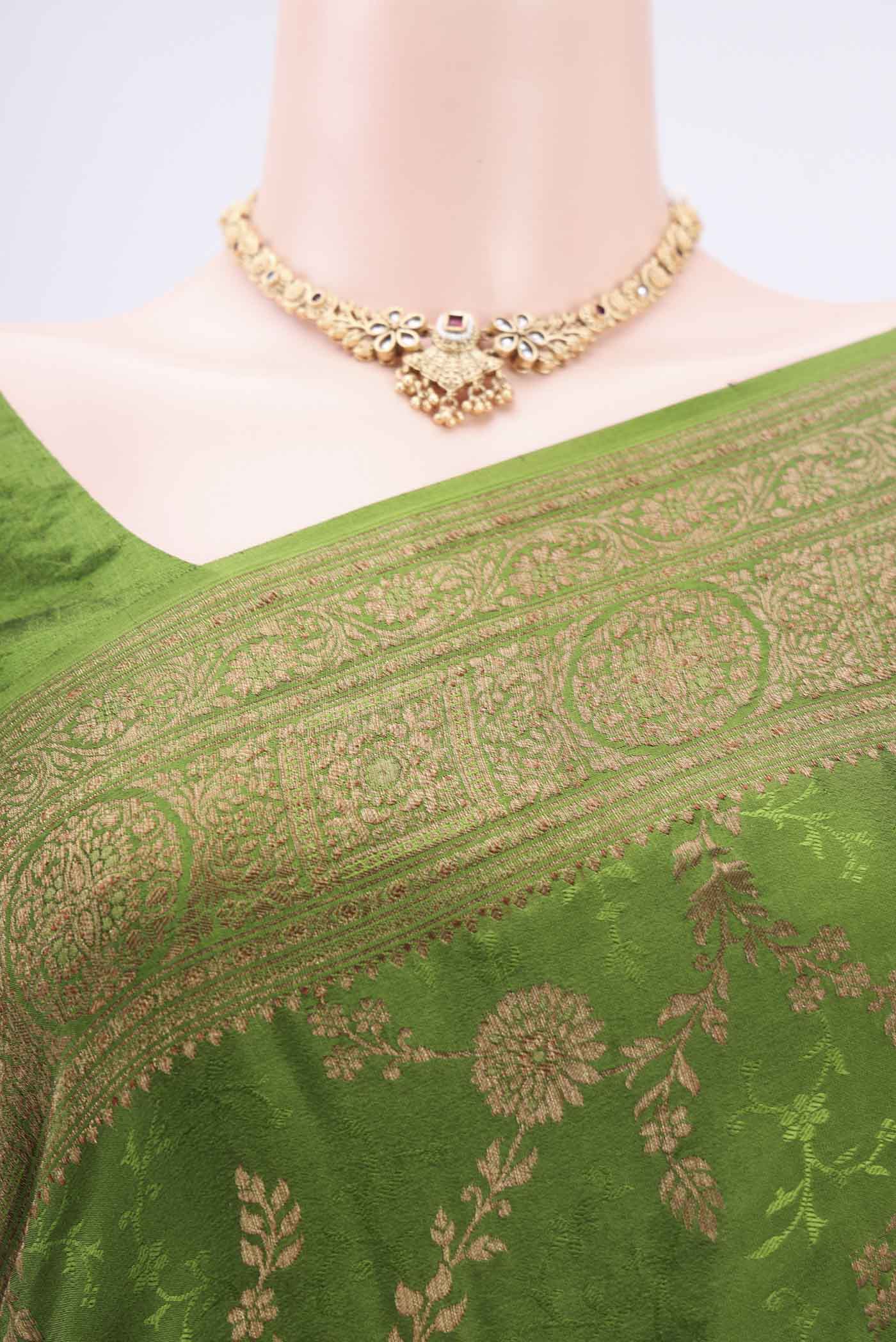 Border image of Green Mysore Crepe Saree with Zari Brocade on the body and Zari Border. 