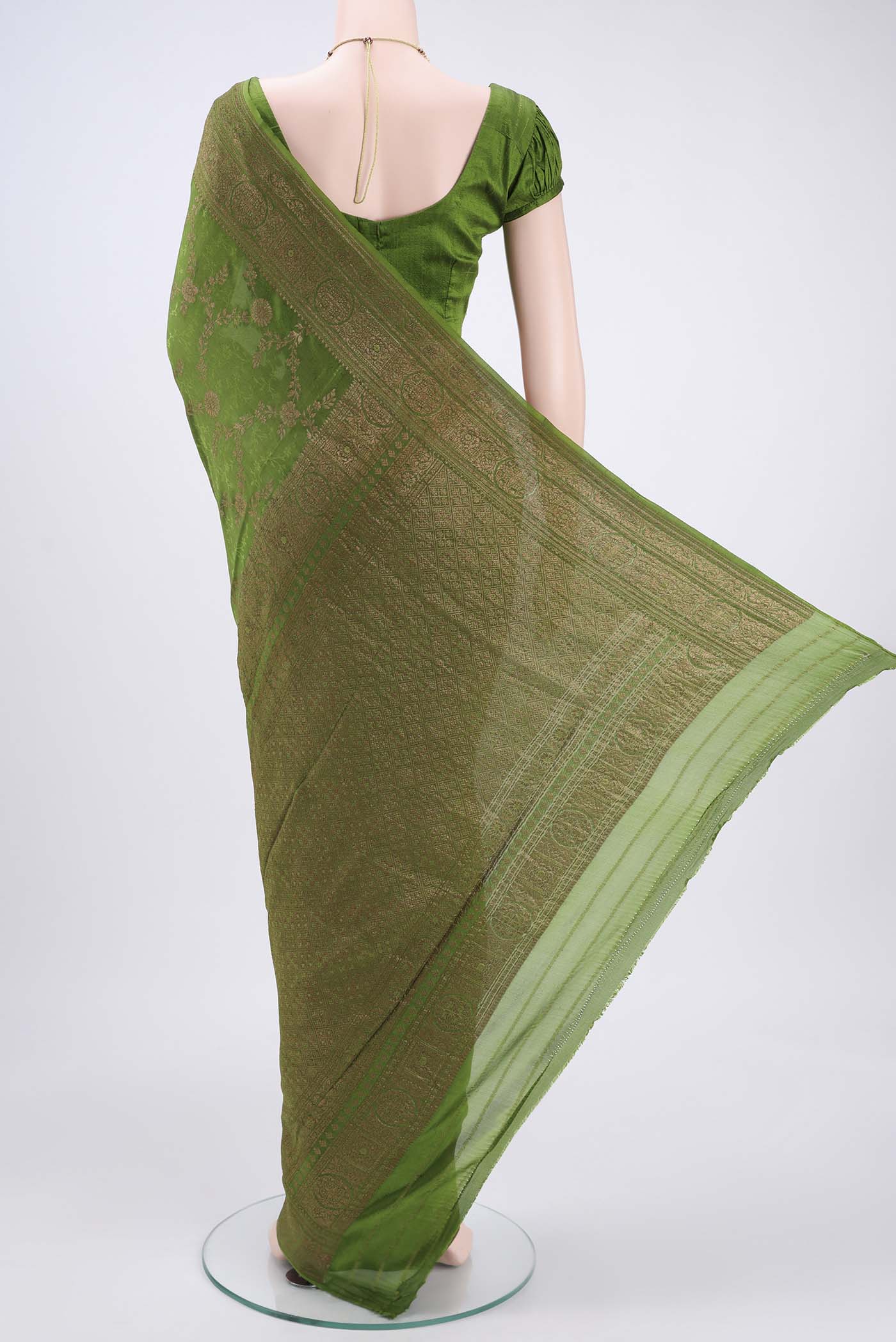 Flat view of Green Mysore Crepe Saree with Zari Brocade on the body and Zari Border. 
