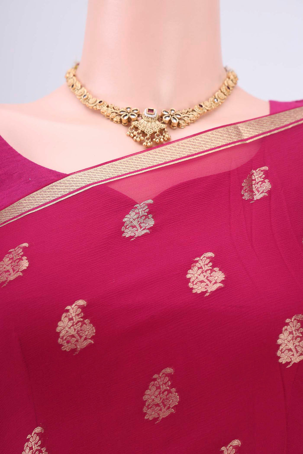 Border image of Rani Pink Mysore Chiffon Saree with Zari Butta on the body and Zari Border. 