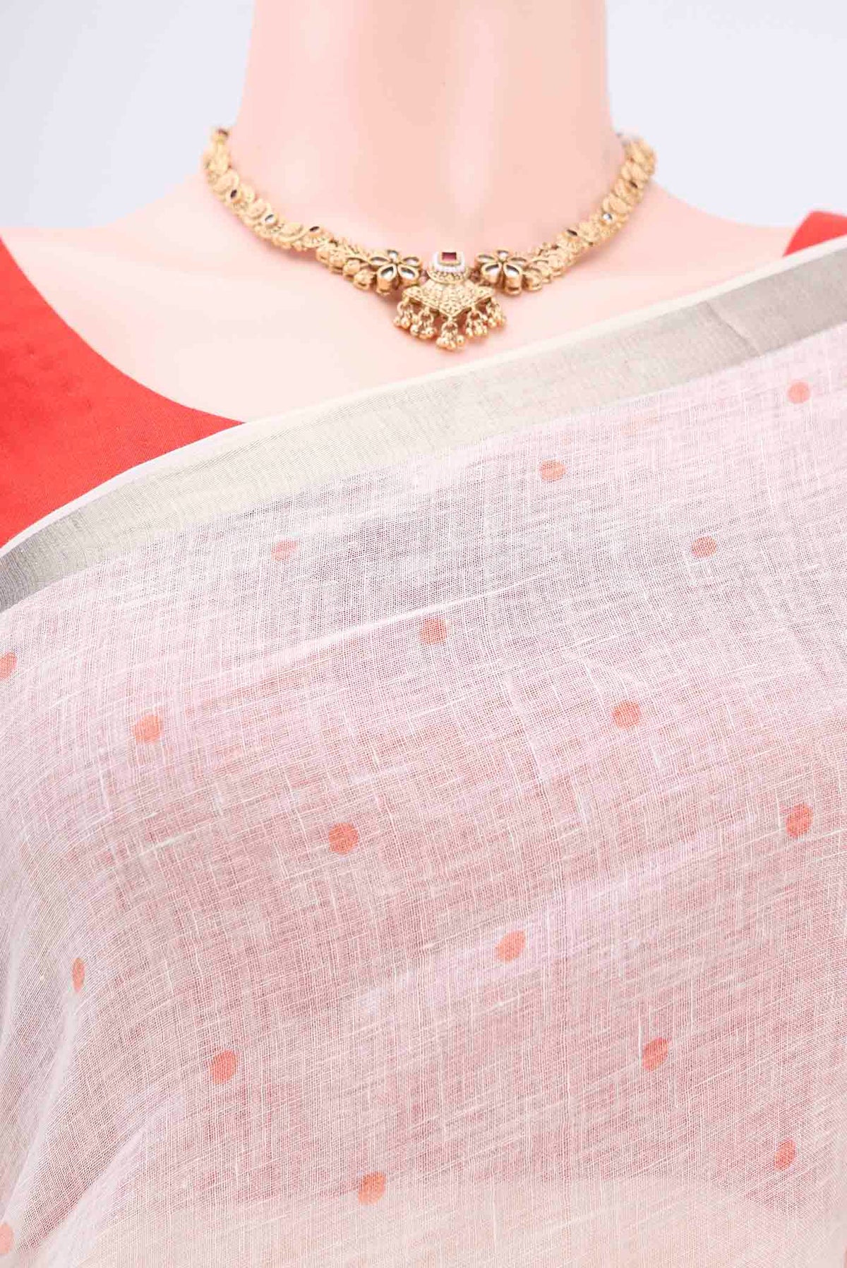 Border image of White Linen Saree with Floral Print on the body and Zari Border. 
