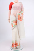 White Linen Saree with Floral Print on the body and Zari Border.  displayed on a mannequin
