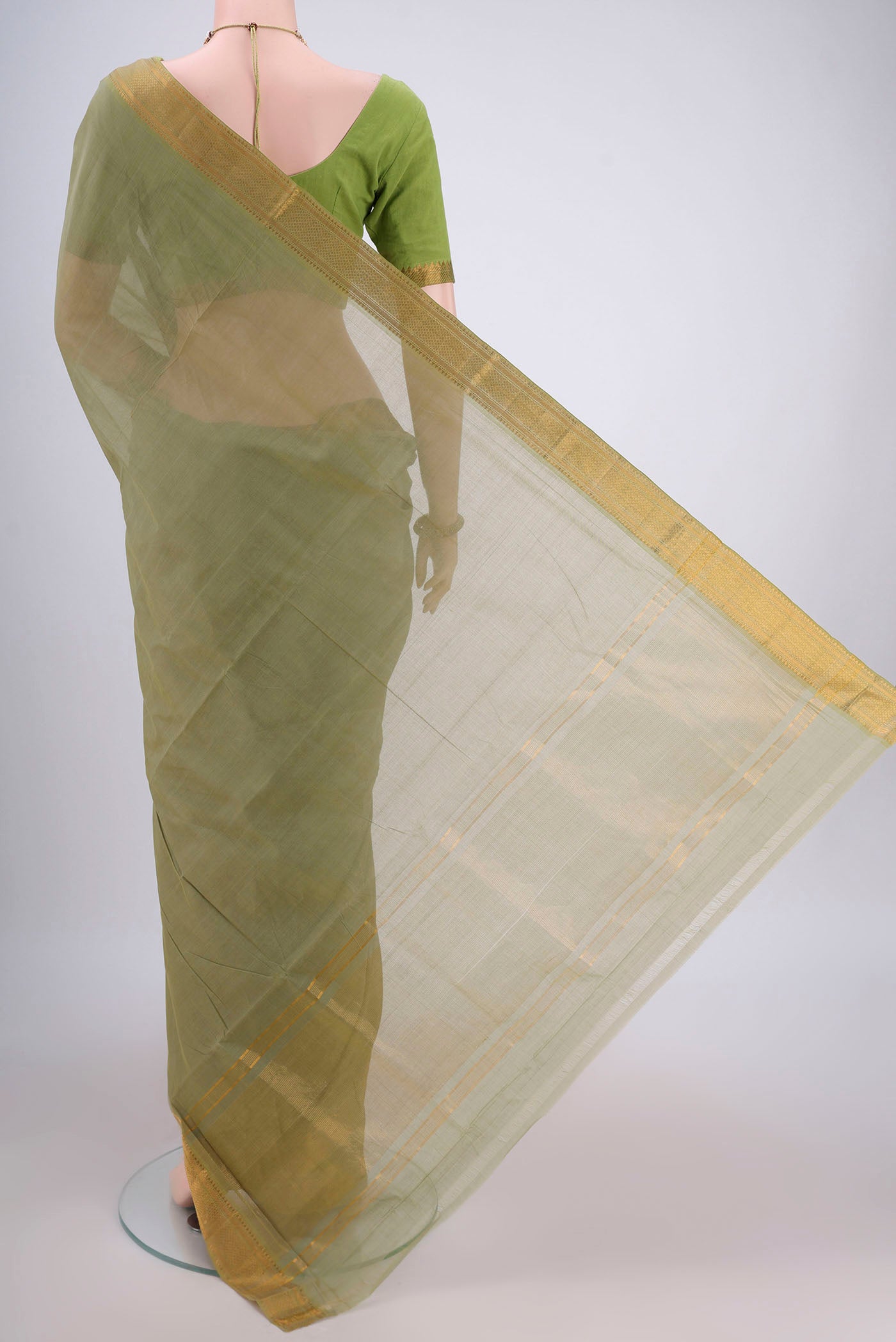 Flat view of Light Green Mangalagiri Cotton Saree with Plain Body and Zari Border. 